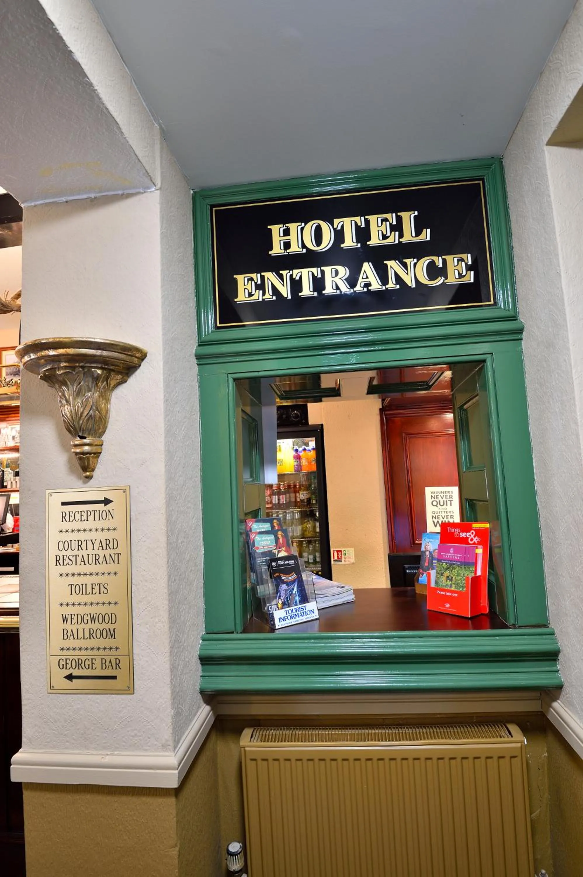 Property logo or sign in The George Hotel