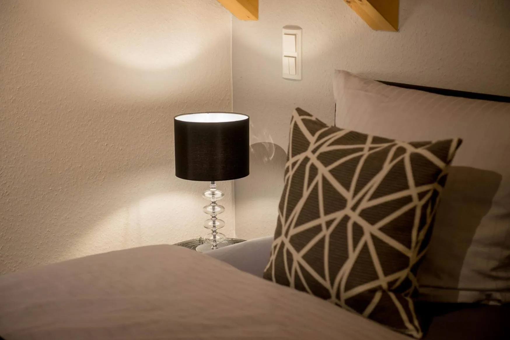 Bed in Design-Apartments by Ulrike Horster