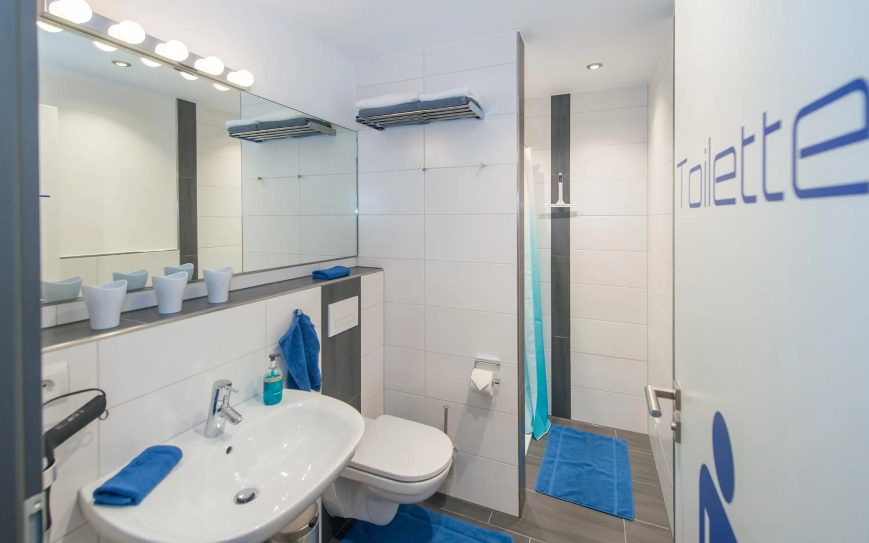 Shower in Design-Apartments by Ulrike Horster