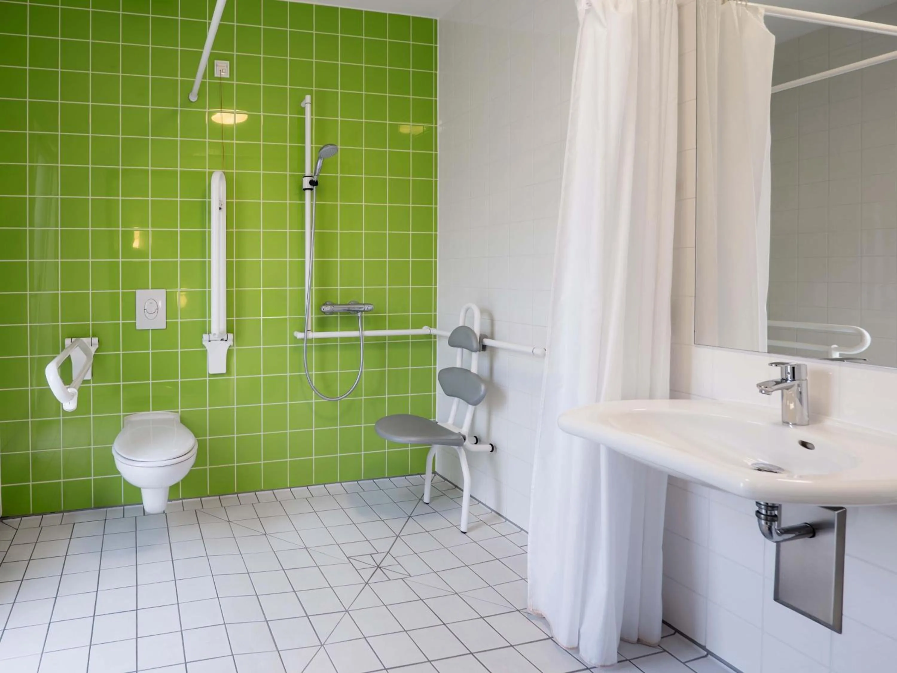 Bathroom in B&B Hotel Offenburg-City