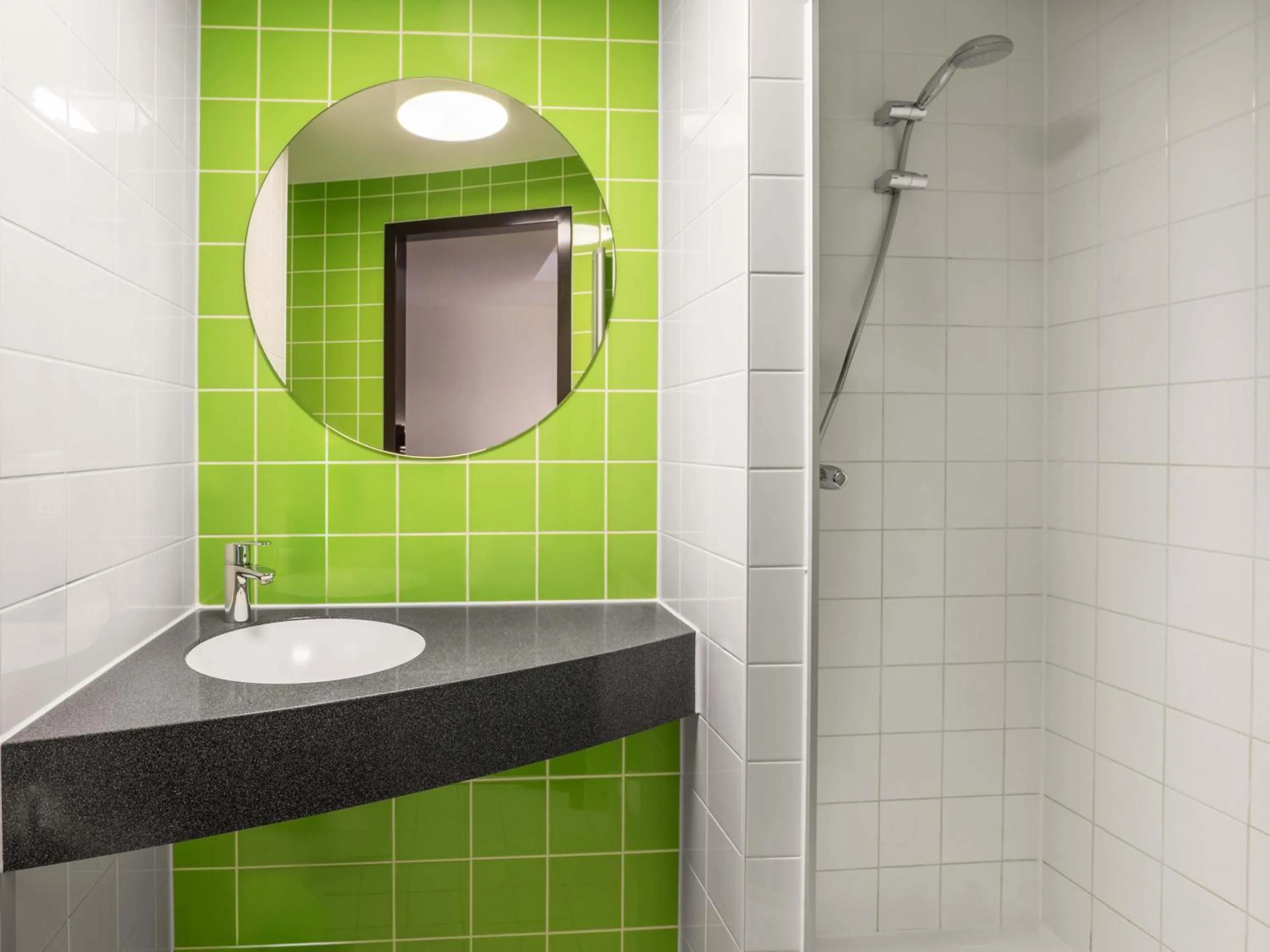 Bathroom in B&B Hotel Offenburg-City