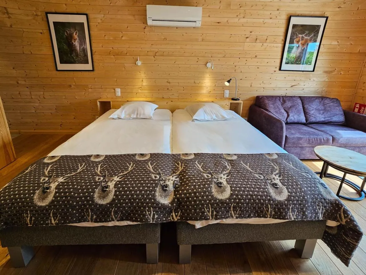 Bed in Logis Hôtel Le Menobu