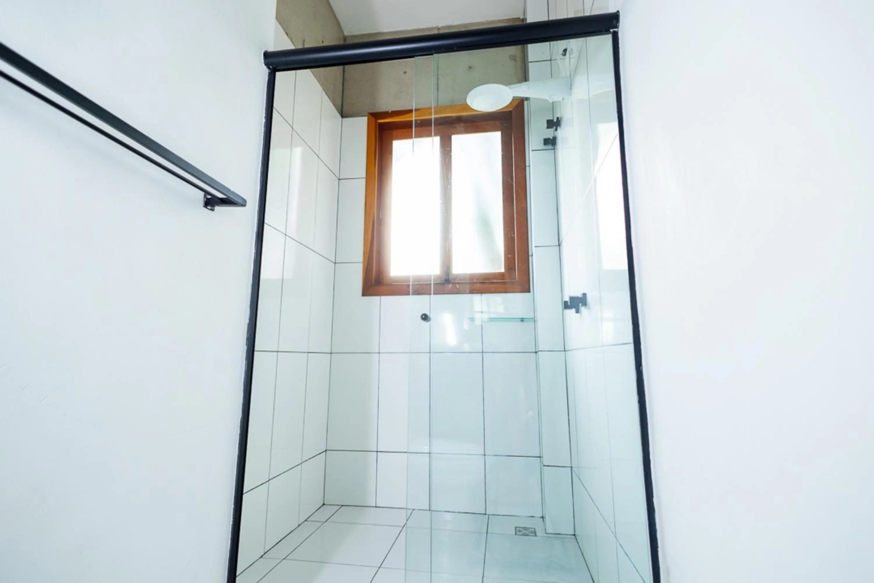 Bathroom in Putini Pousada e Hotel by OYO