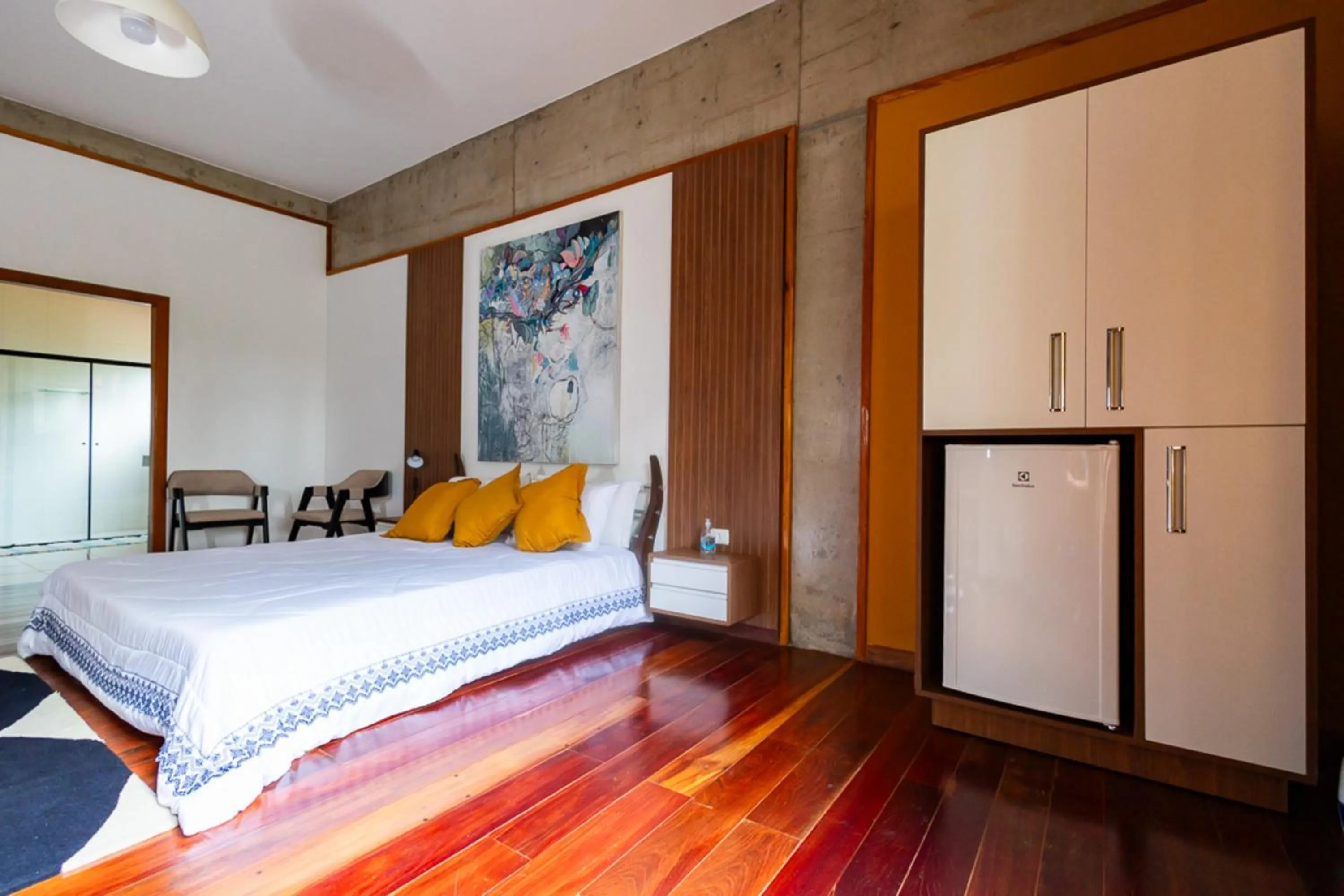 Bedroom, Bed in Putini Pousada e Hotel by OYO