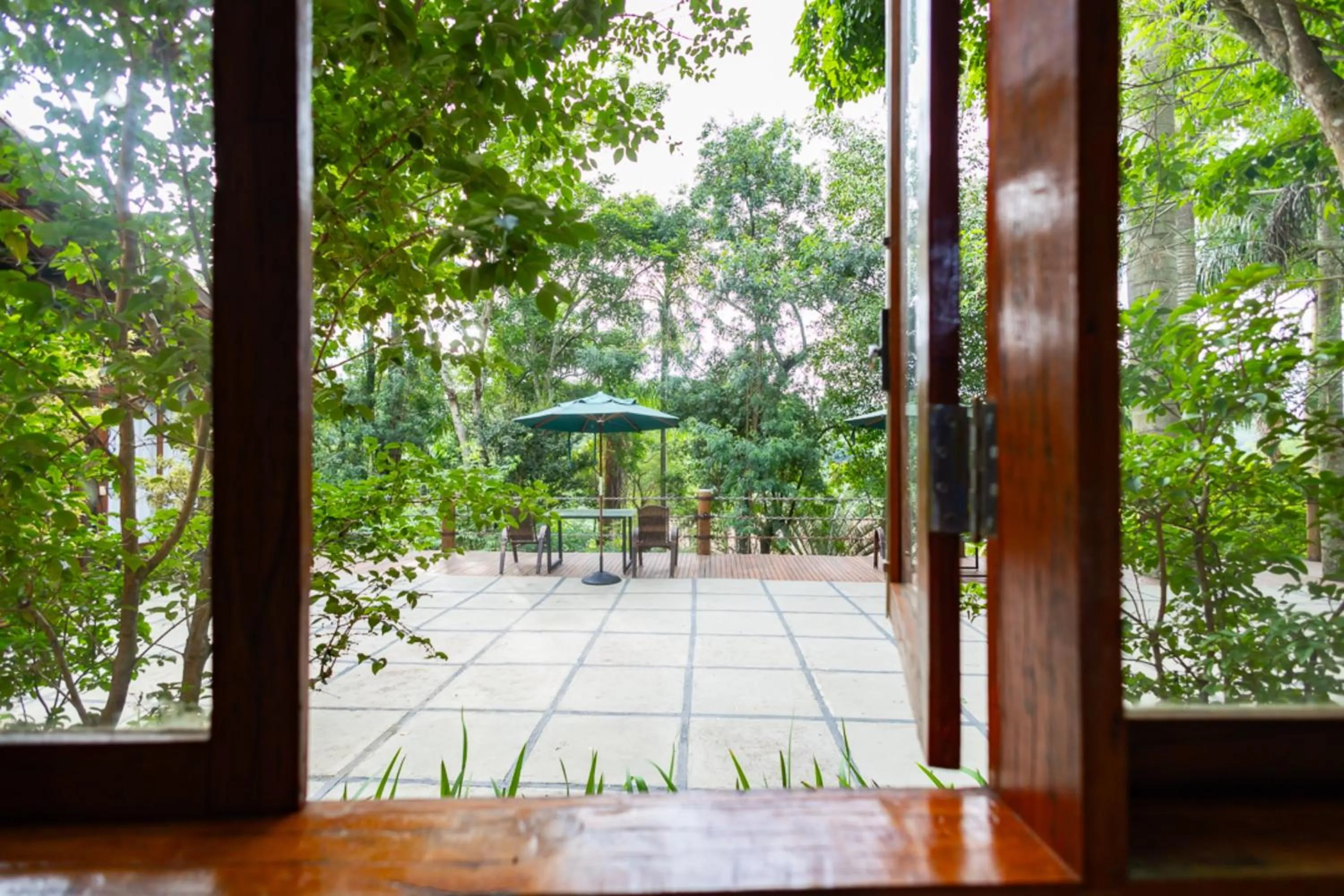 Garden view in Putini Pousada e Hotel by OYO