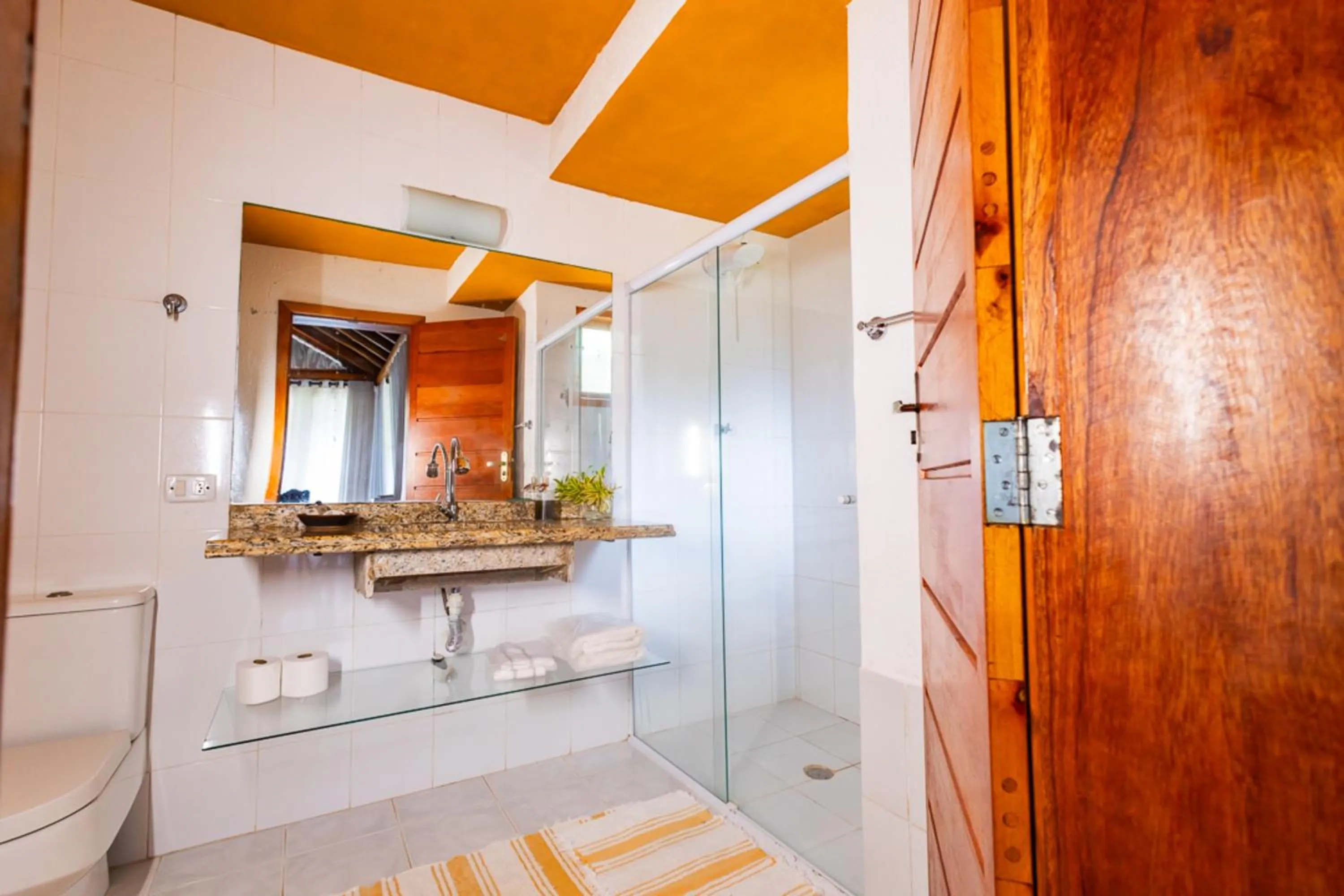 Bathroom in Putini Pousada e Hotel by OYO