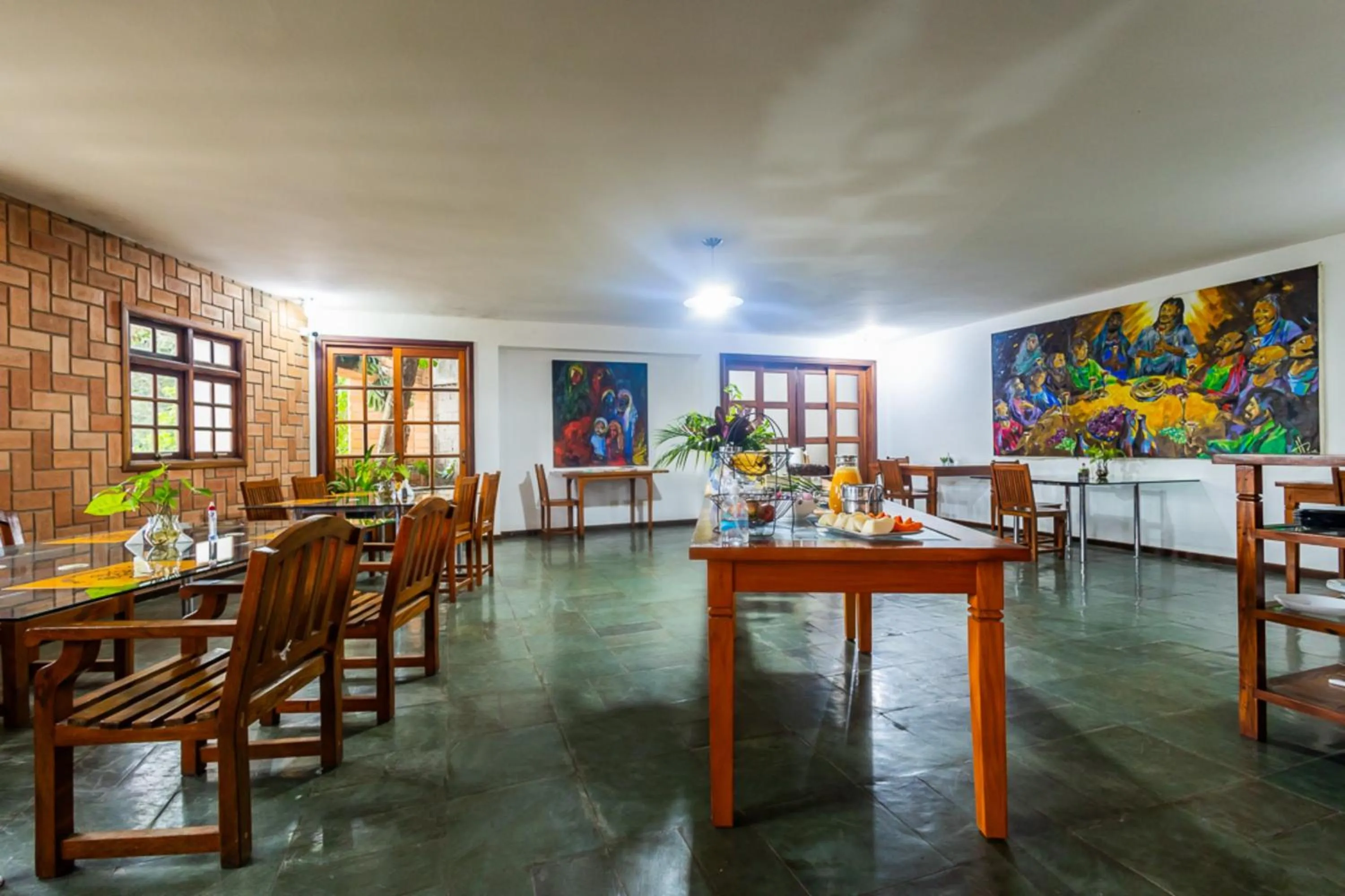 Restaurant/places to eat in Putini Pousada e Hotel by OYO