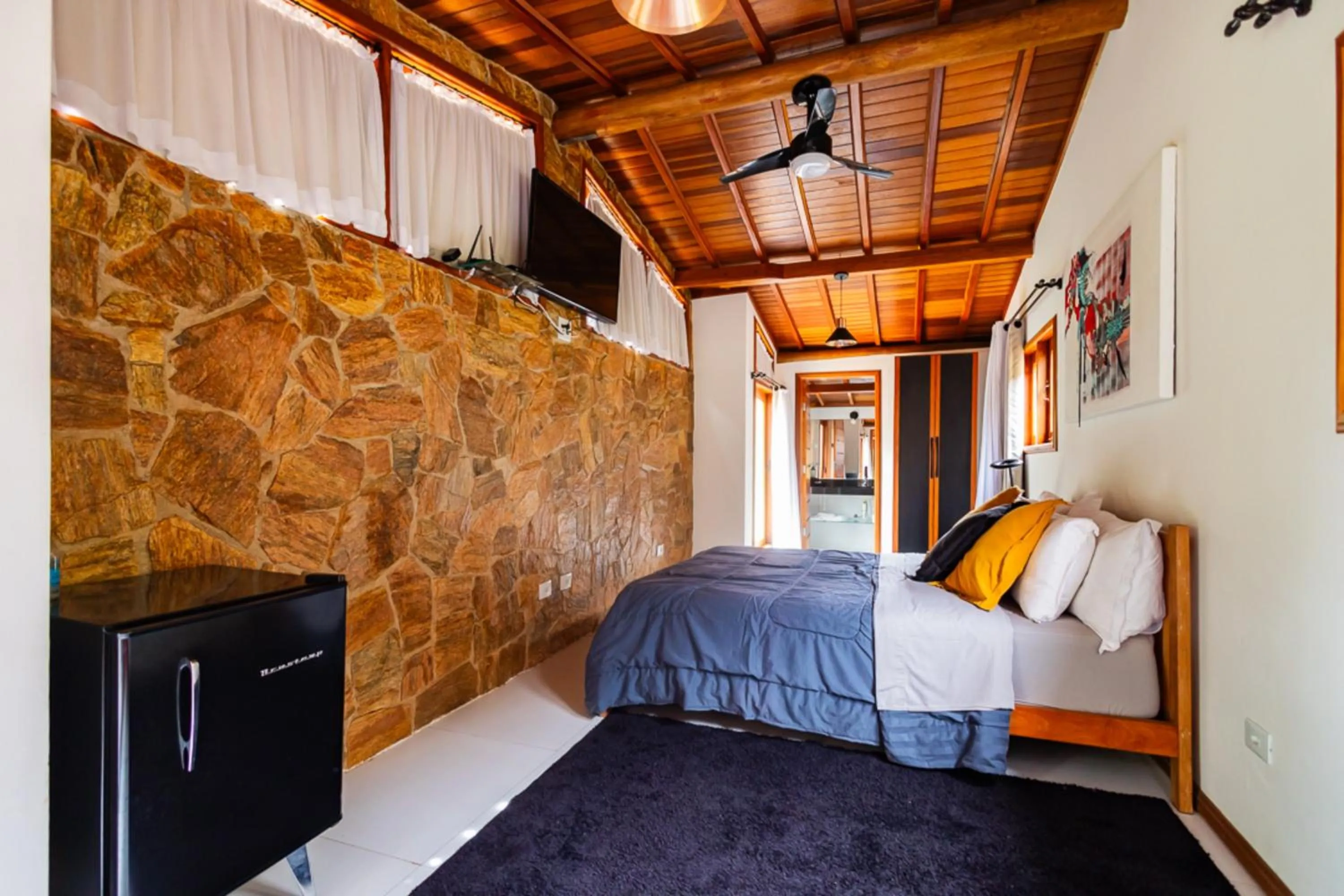 Bedroom, Bed in Putini Pousada e Hotel by OYO