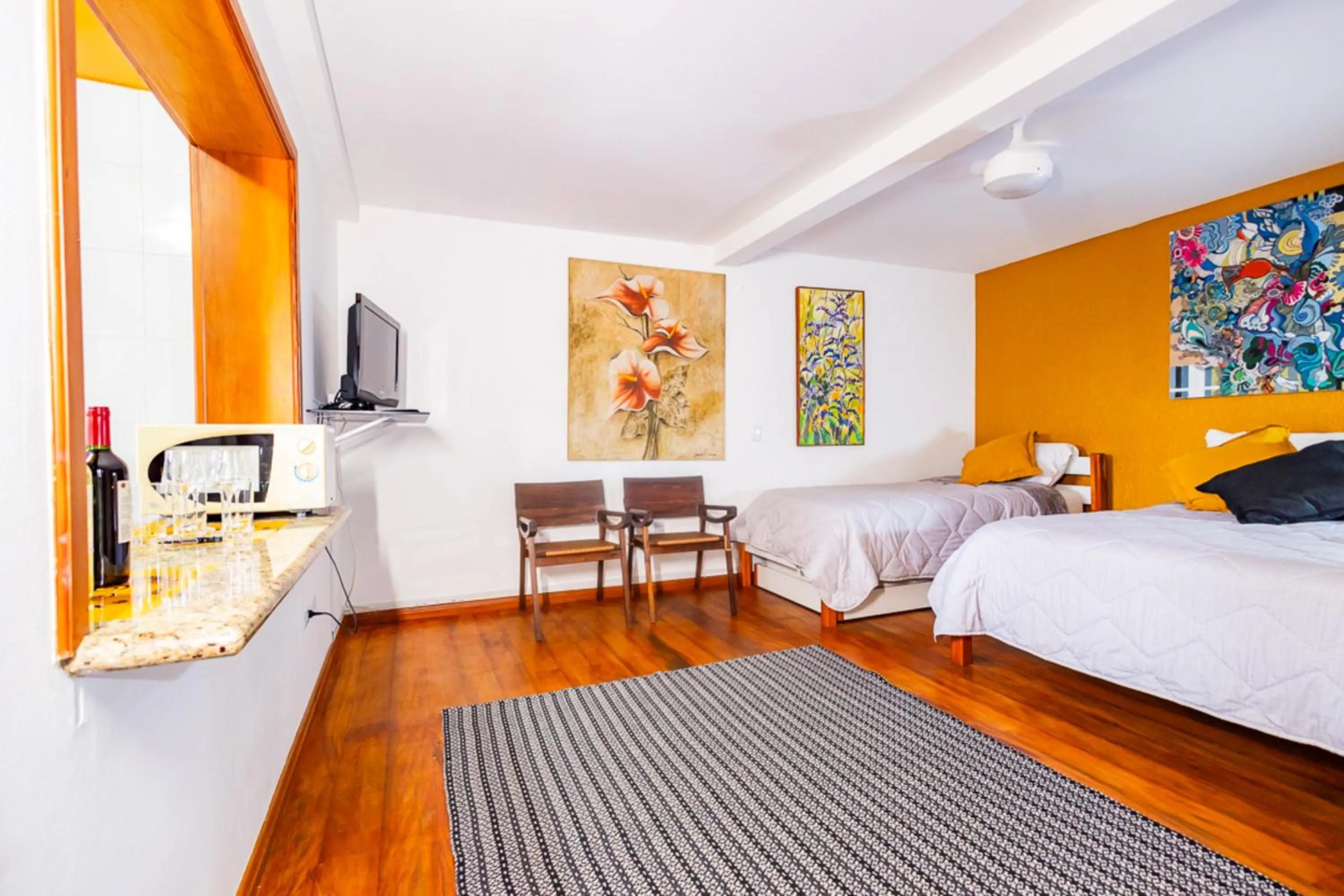 Bedroom, Bed in Putini Pousada e Hotel by OYO