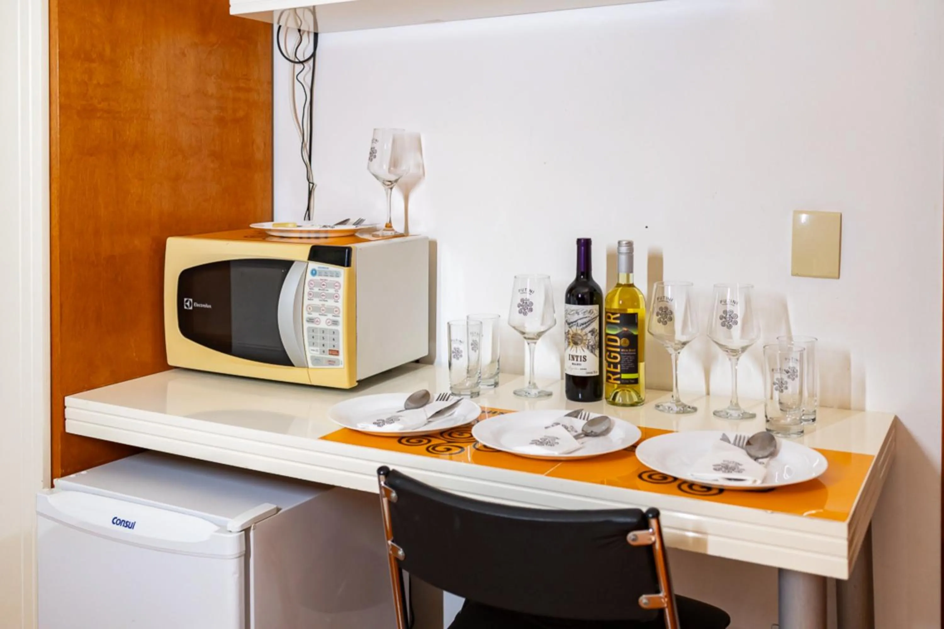 Kitchen or kitchenette in Putini Pousada e Hotel by OYO