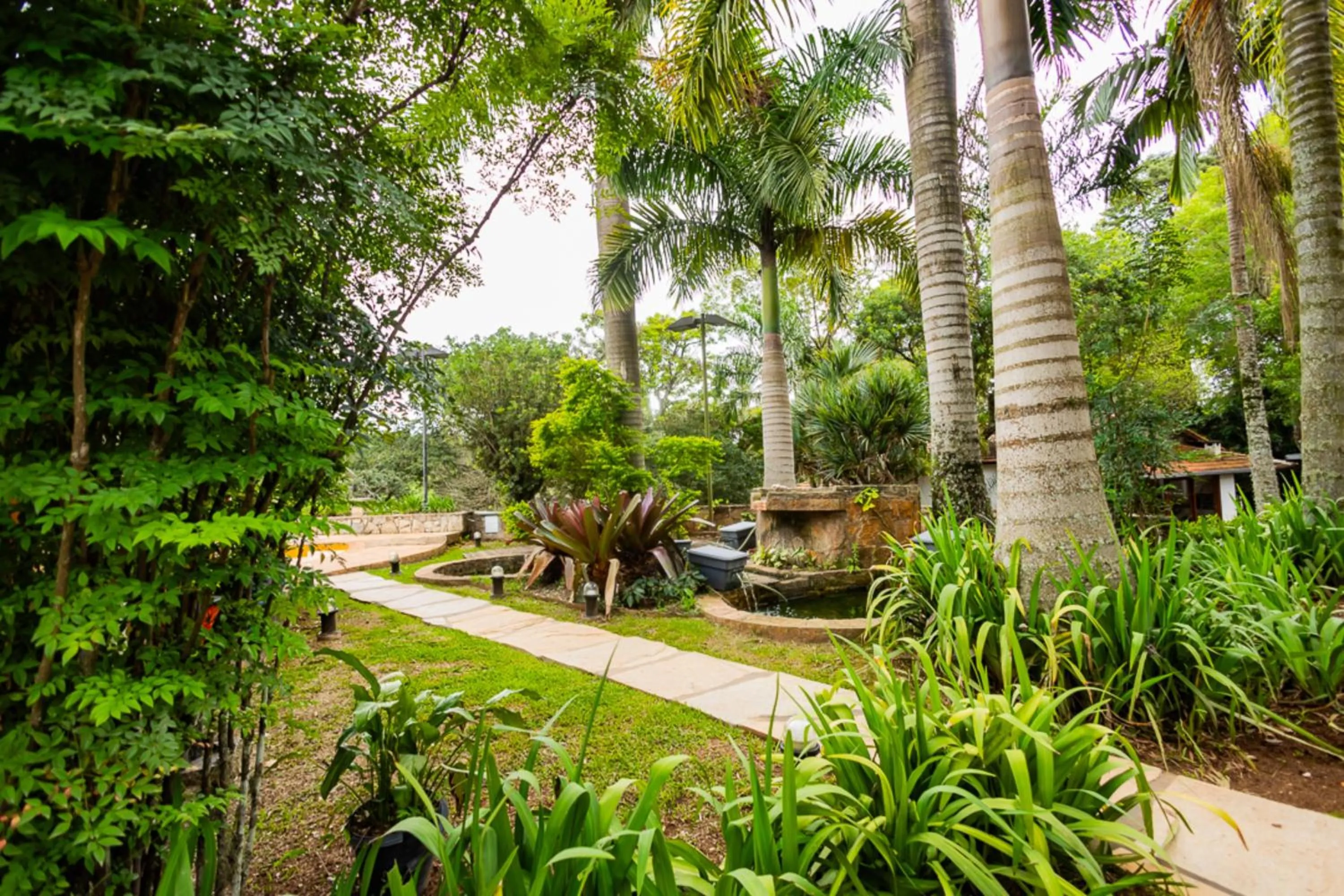 Garden in Putini Pousada e Hotel by OYO