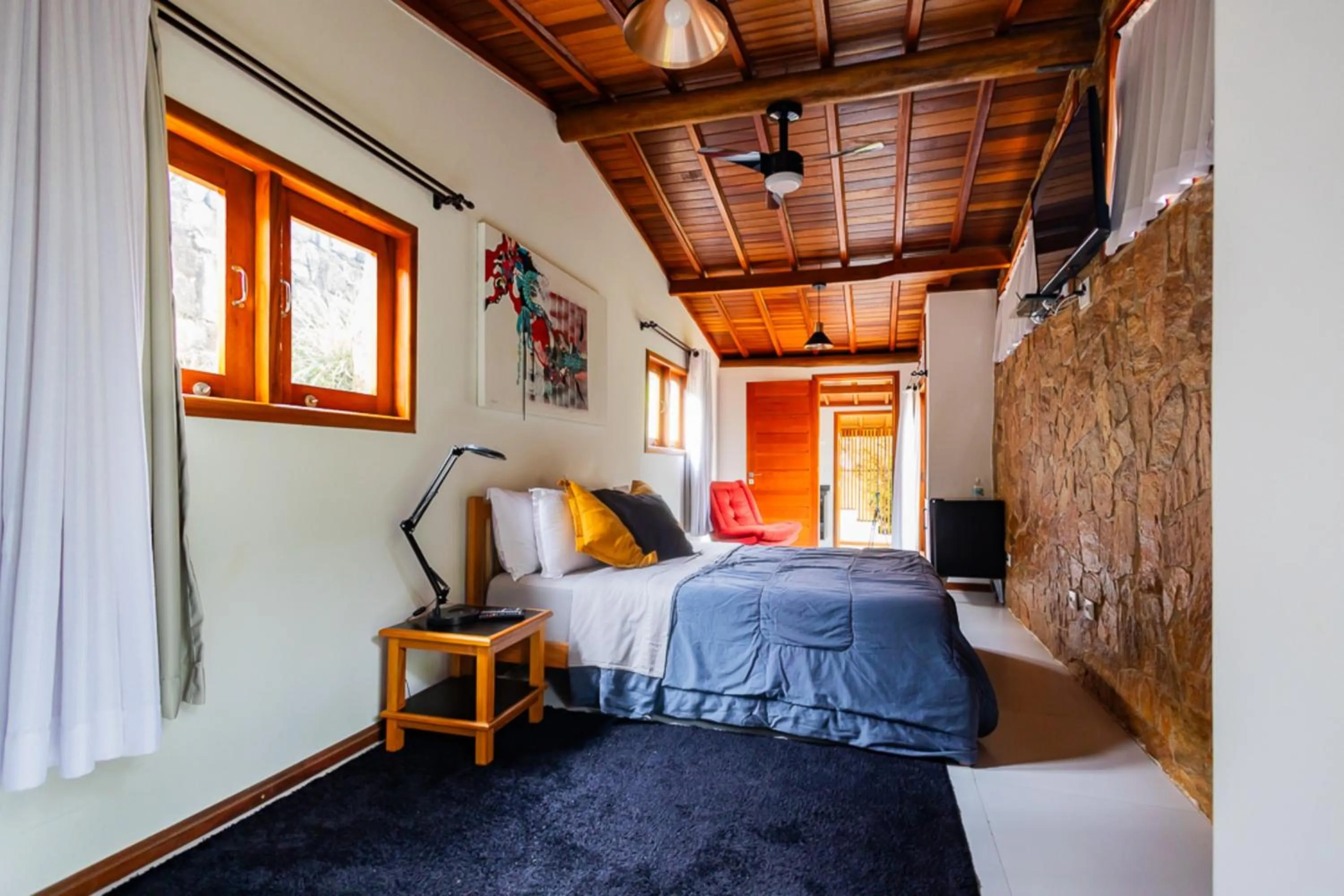 Bedroom, Bed in Putini Pousada e Hotel by OYO