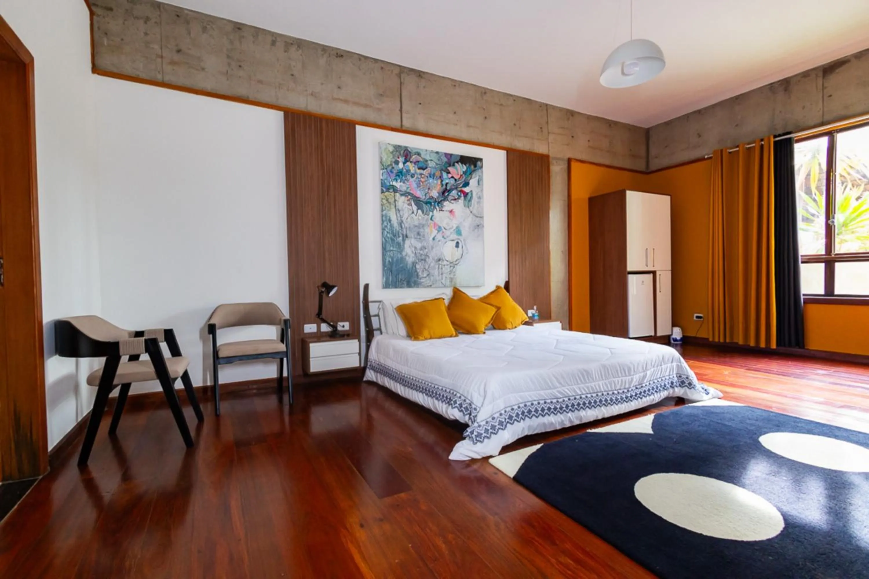 Bedroom, Bed in Putini Pousada e Hotel by OYO