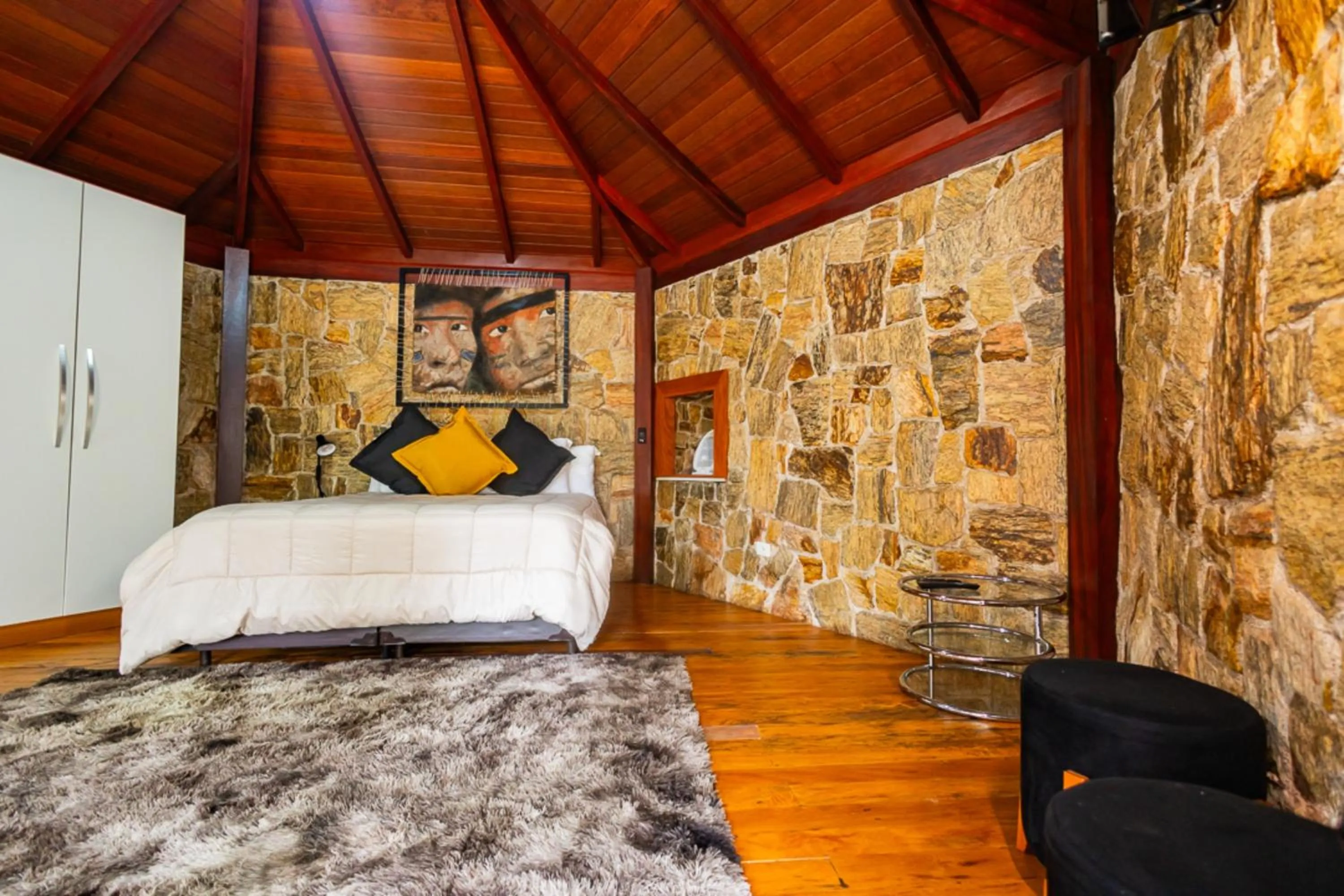 Bedroom, Bed in Putini Pousada e Hotel by OYO