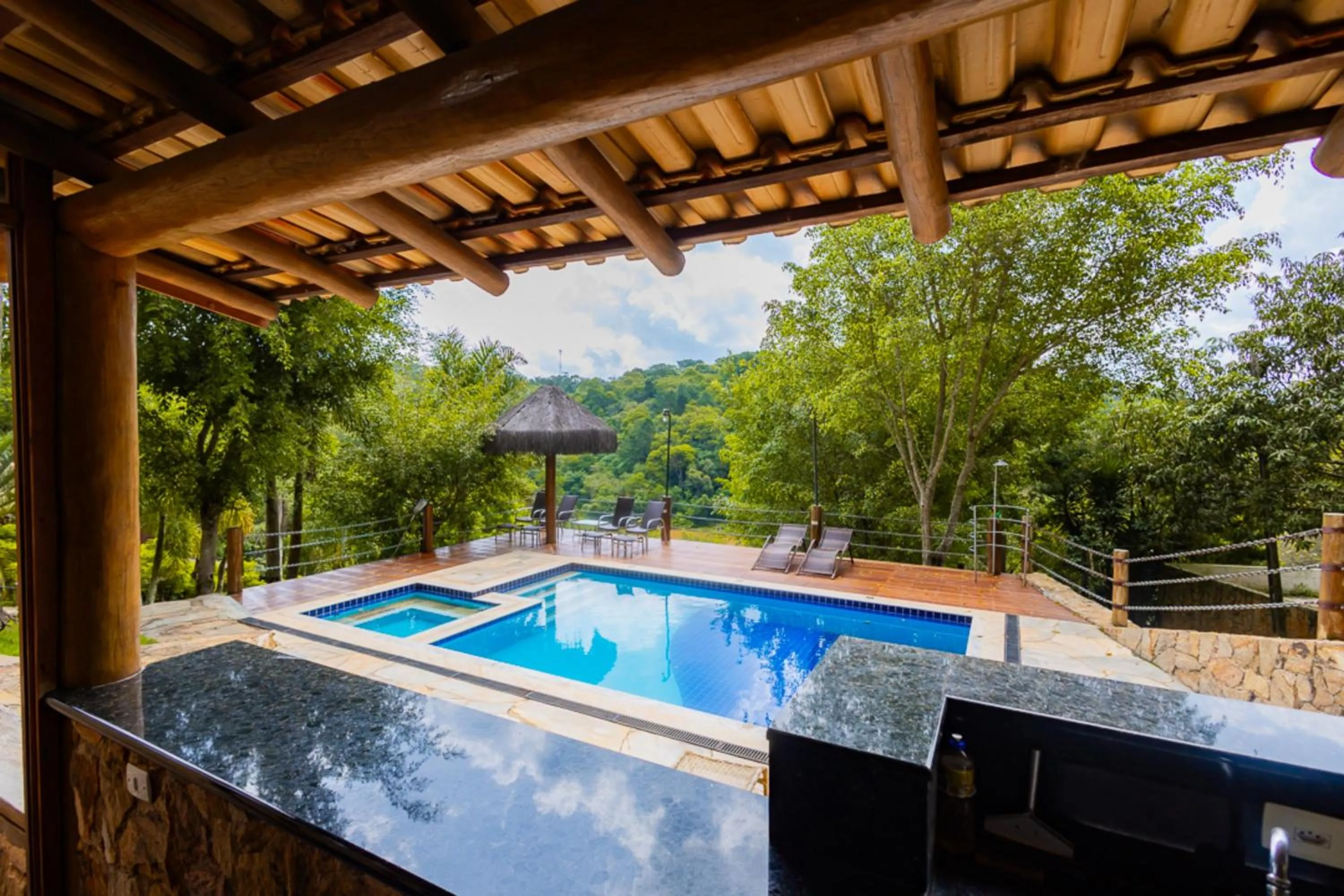 Pool view in Putini Pousada e Hotel by OYO