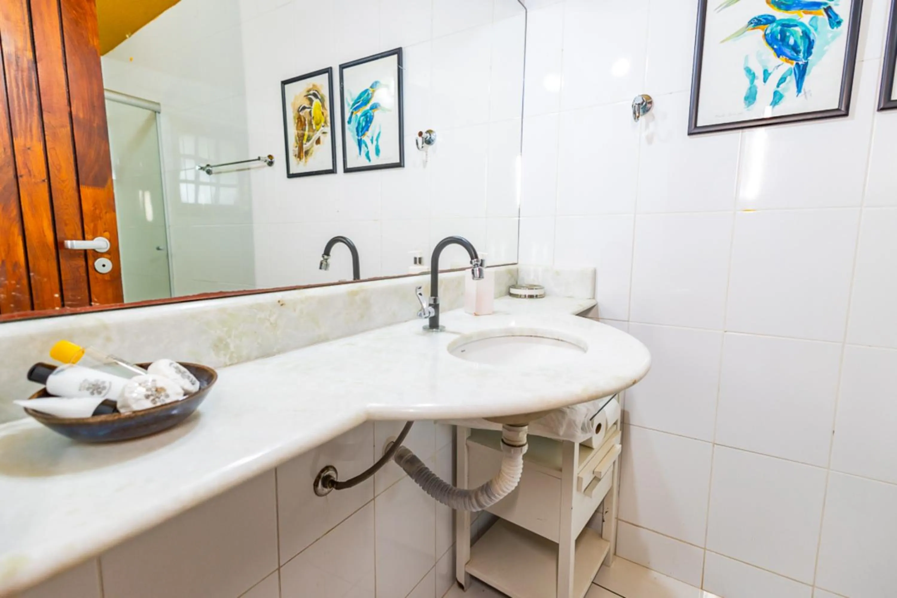 Bathroom in Putini Pousada e Hotel by OYO