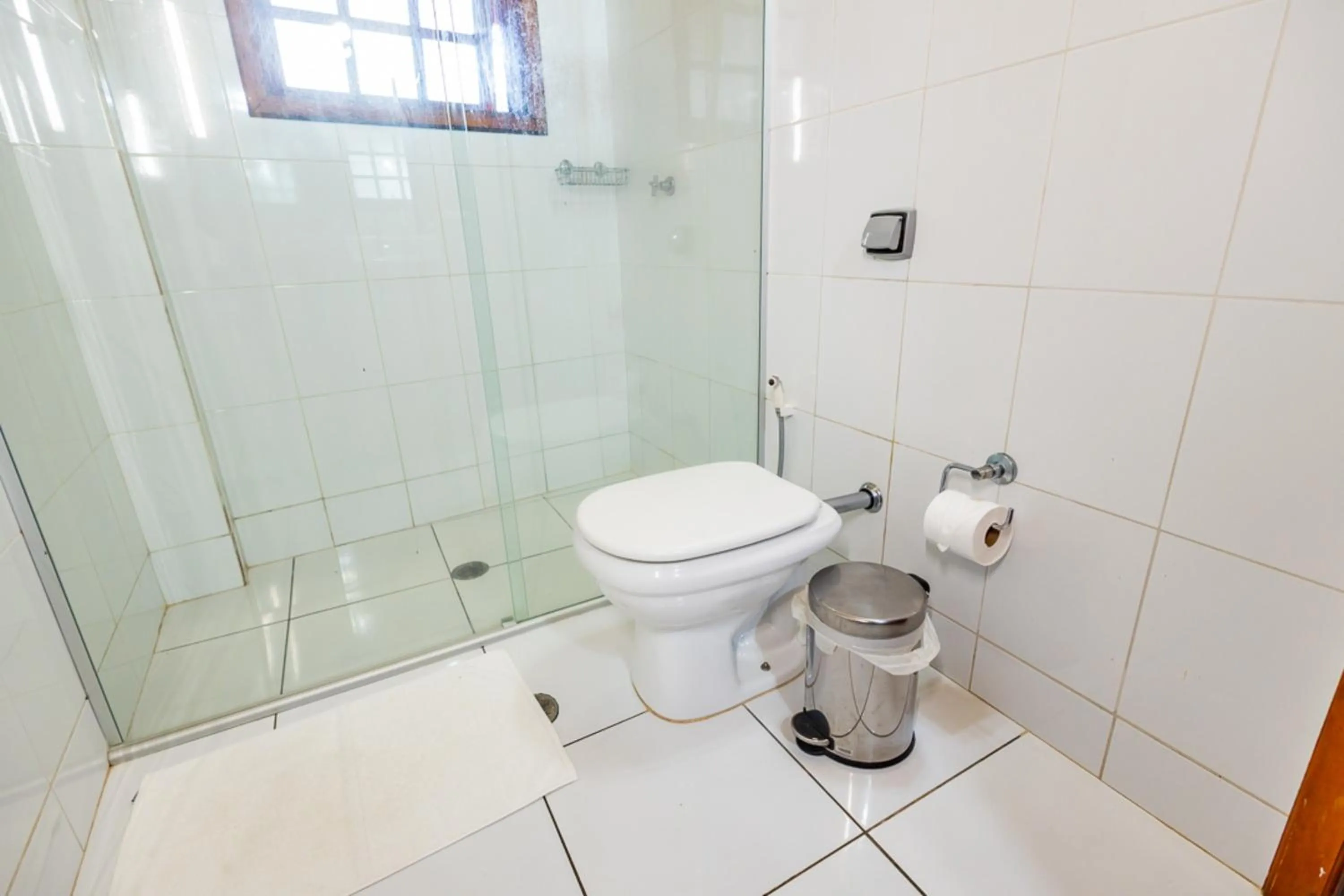 Bathroom in Putini Pousada e Hotel by OYO