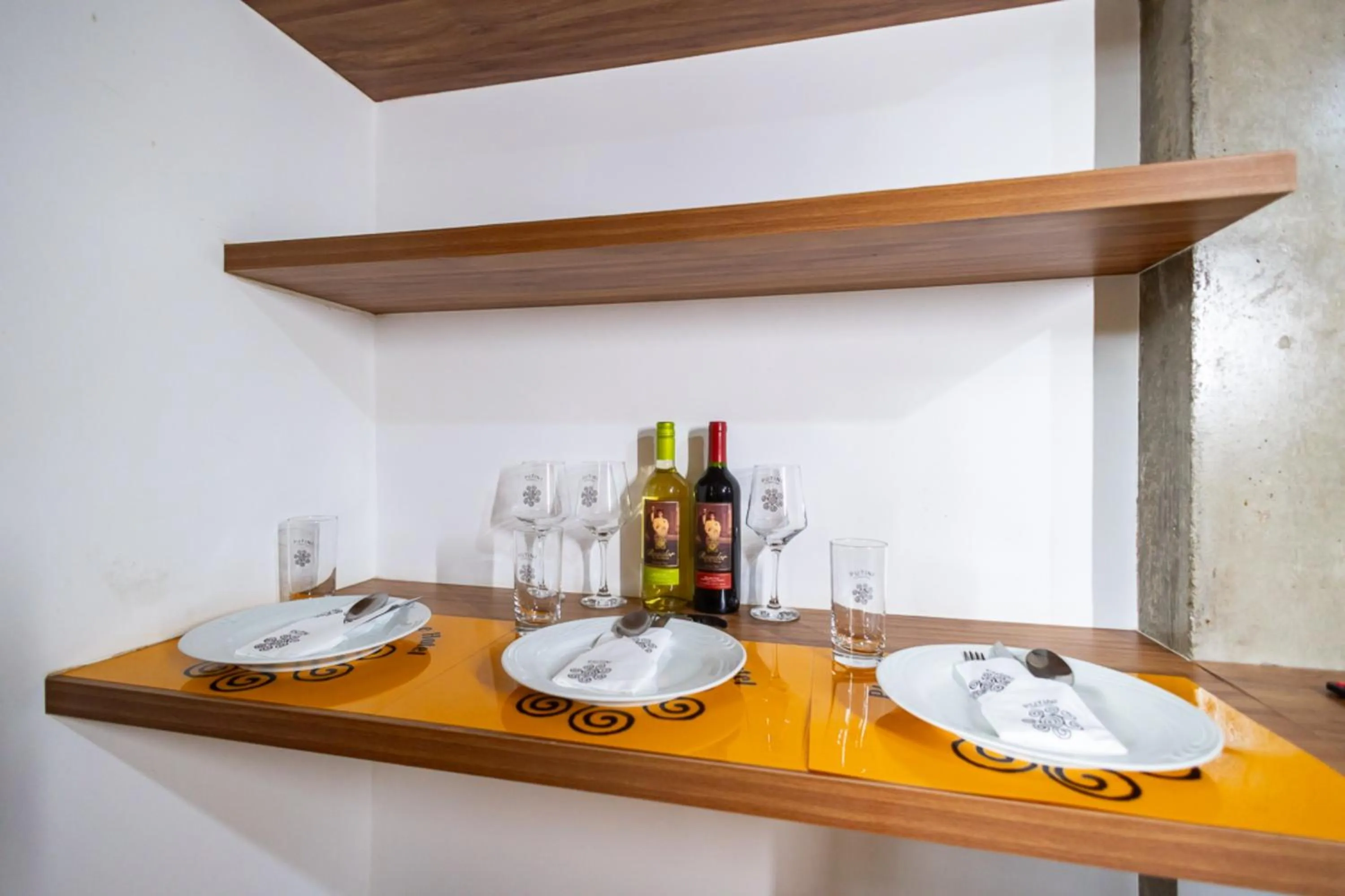 Dining area in Putini Pousada e Hotel by OYO