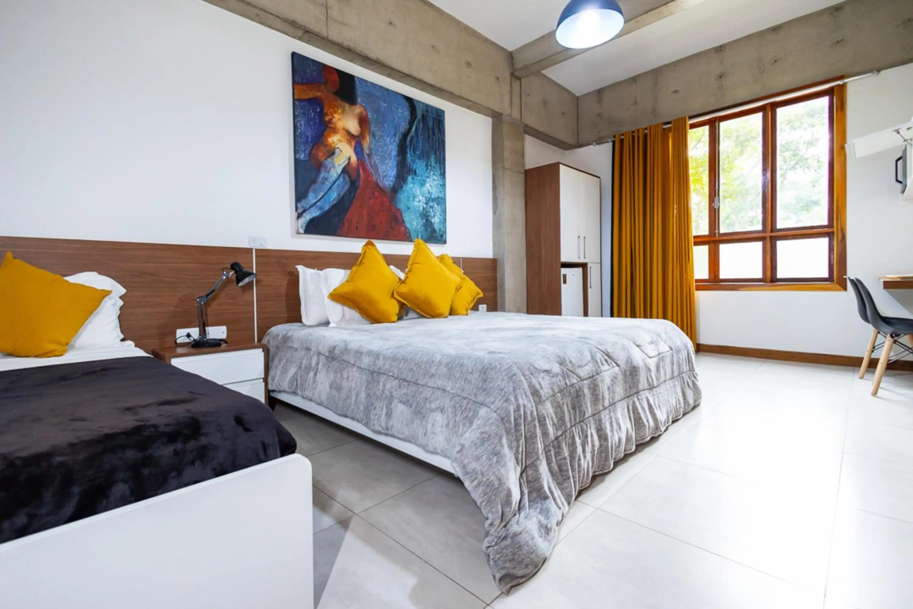 Bedroom, Bed in Putini Pousada e Hotel by OYO