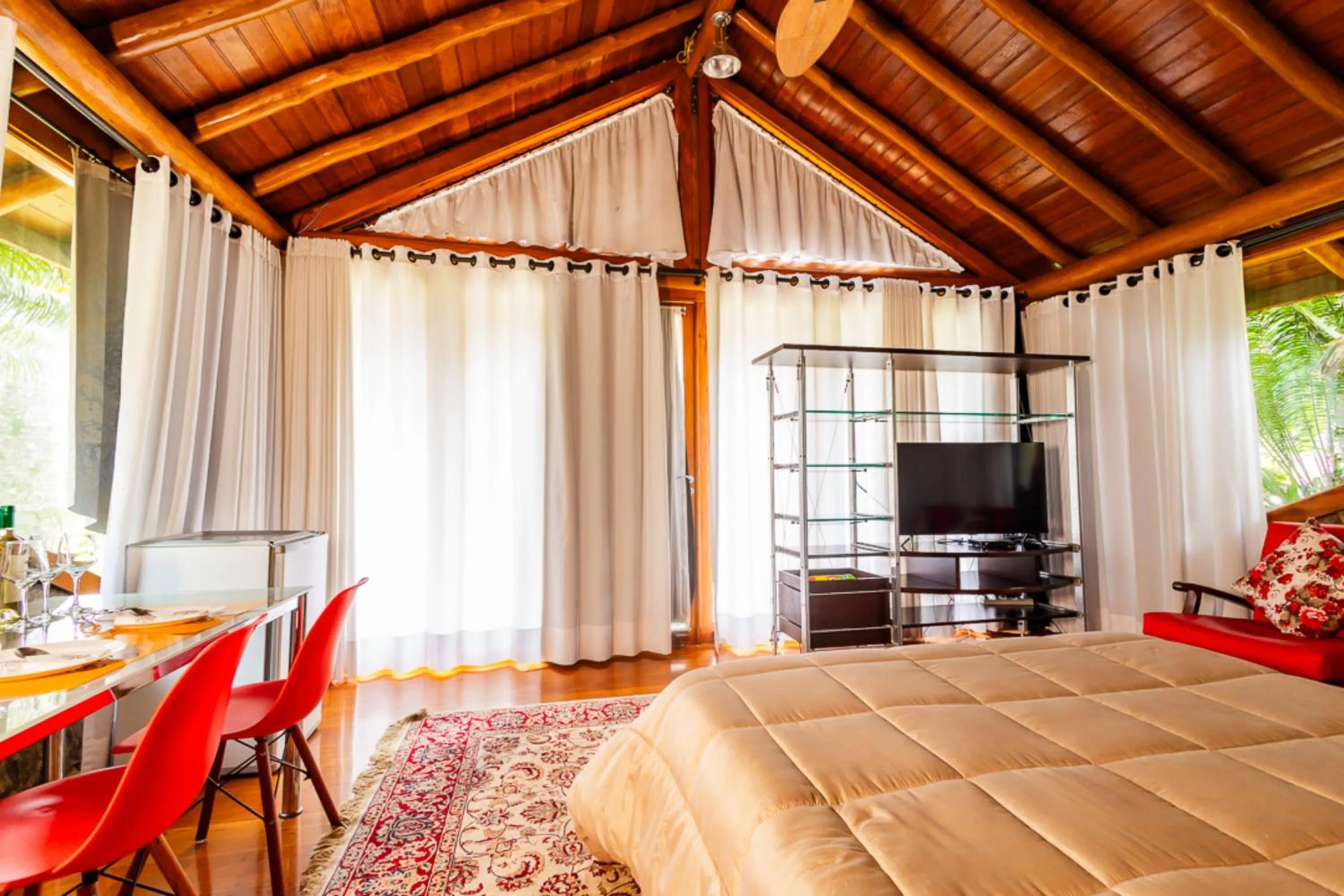 Bedroom in Putini Pousada e Hotel by OYO