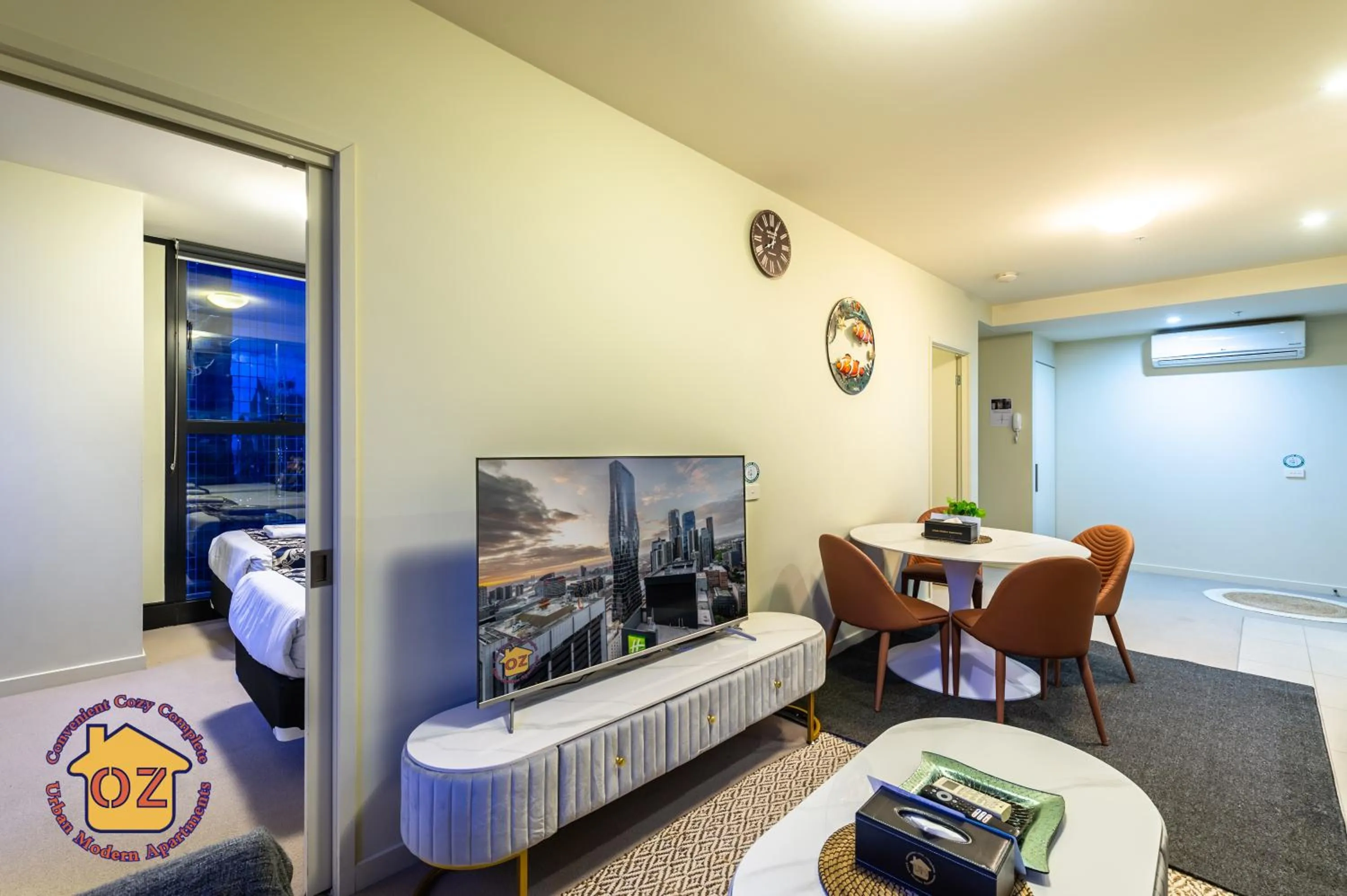 Living room, Bed in Aussie Escape Apartments-Skyline Collins Tower