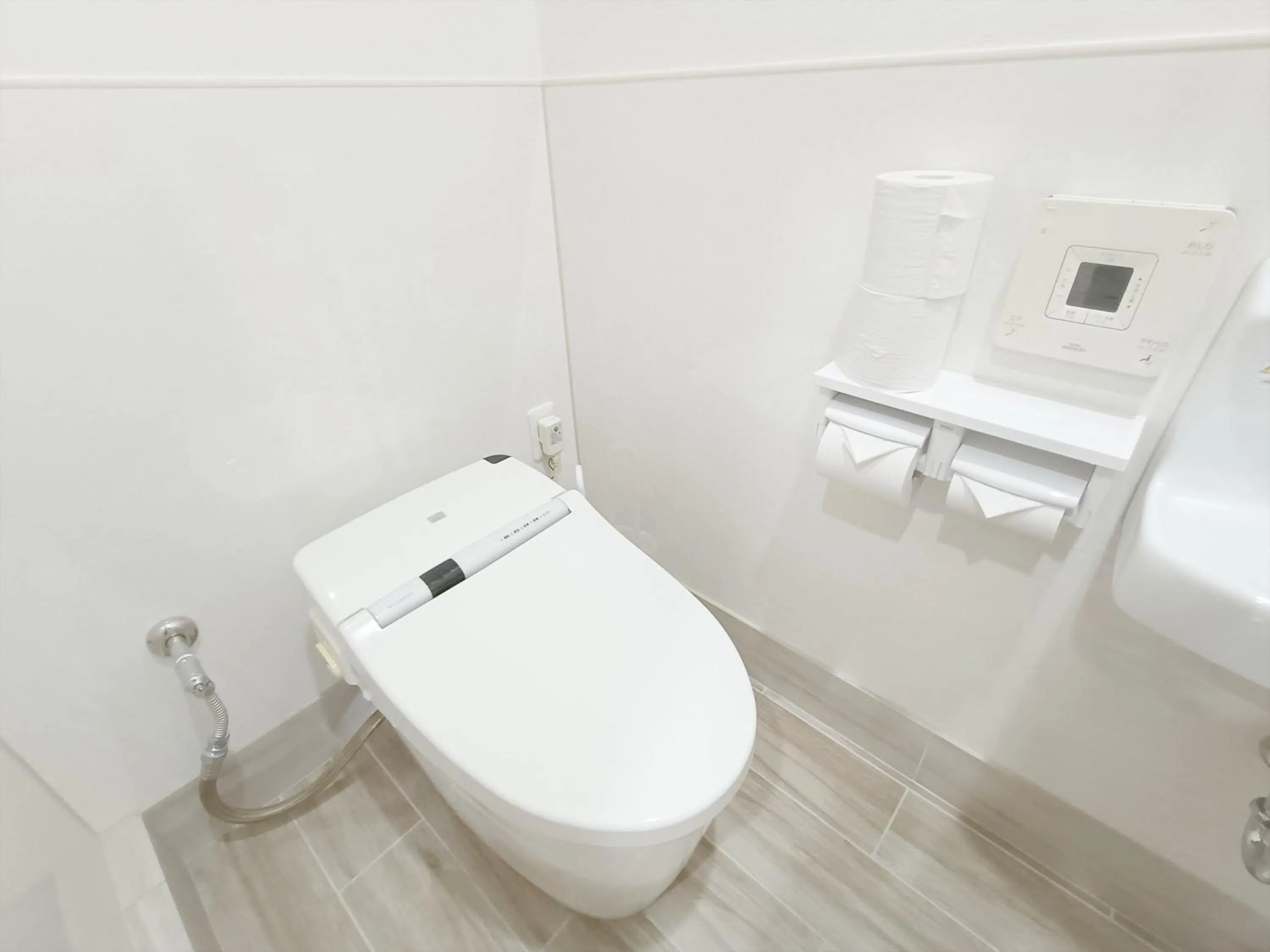 Toilet in Kariyushi Condominium Resort Sea Side House