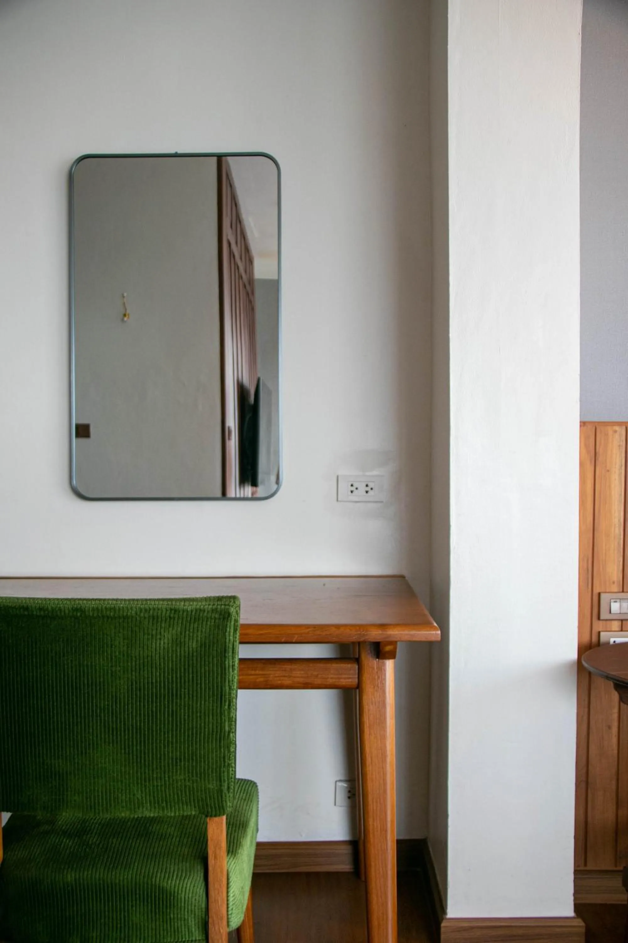 Communal lounge/ TV room in Lamphu Tree House Boutique Hotel