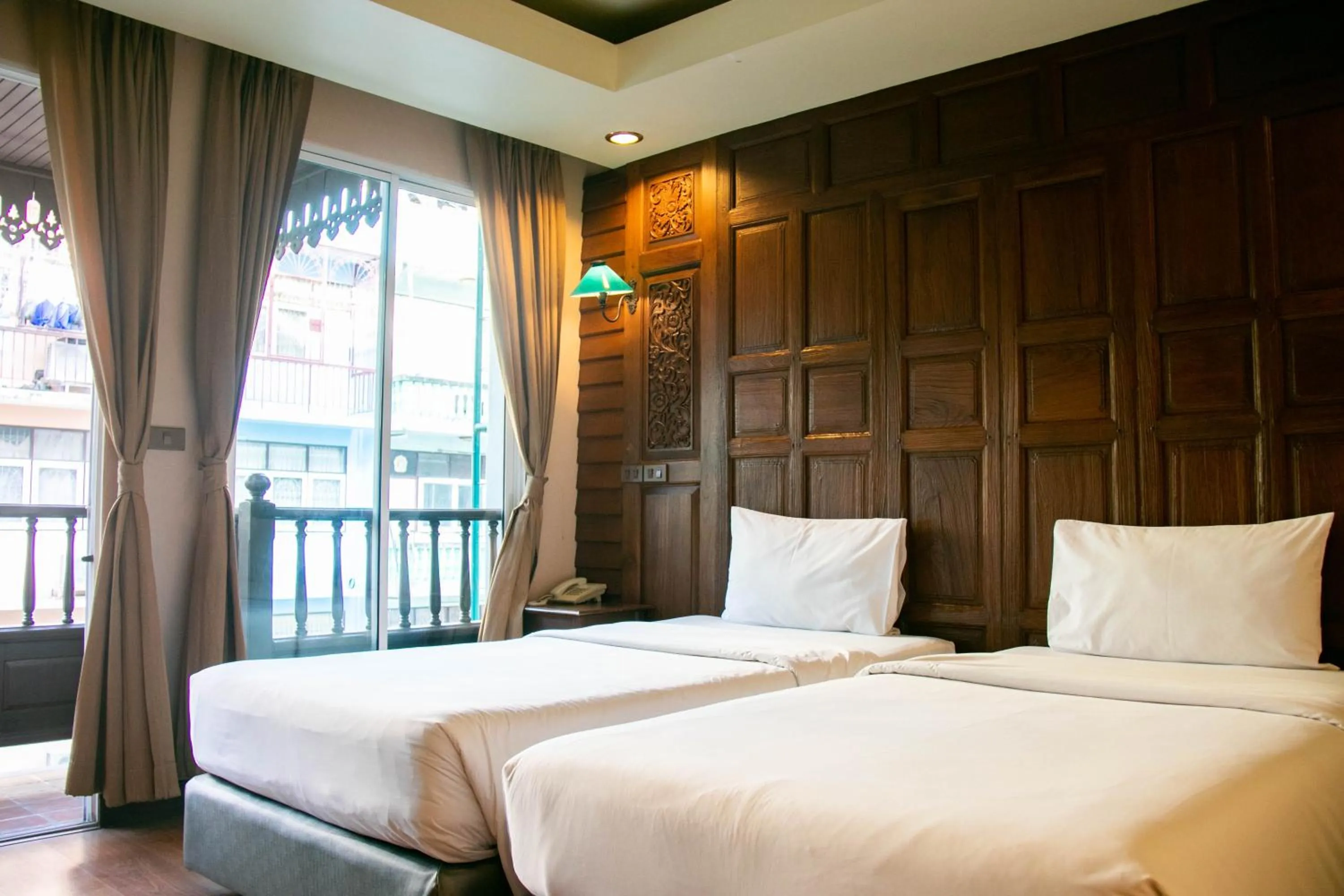 Photo of the whole room, Bed in Lamphu Tree House Boutique Hotel