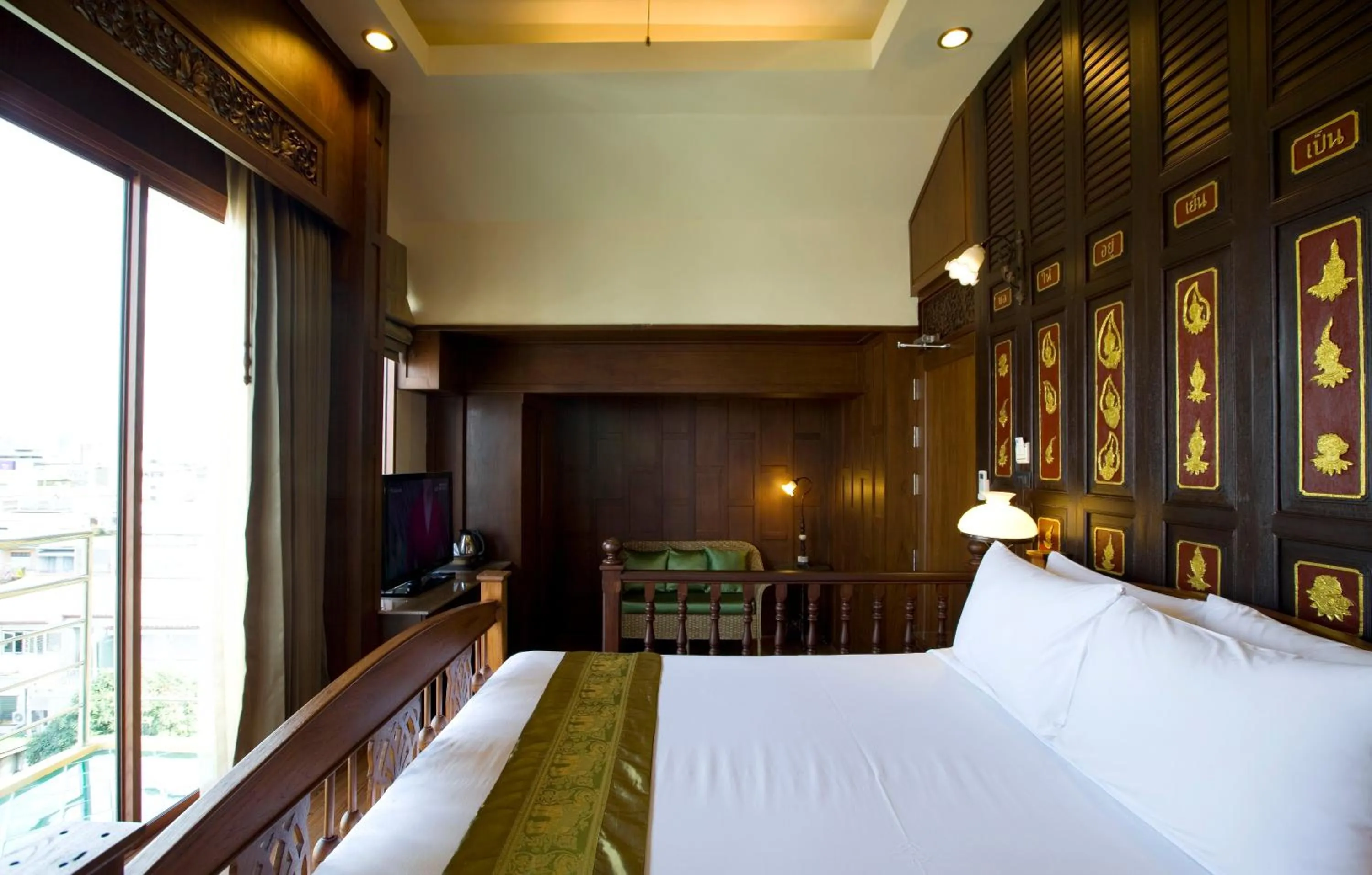 Photo of the whole room, Bed in Lamphu Tree House Boutique Hotel