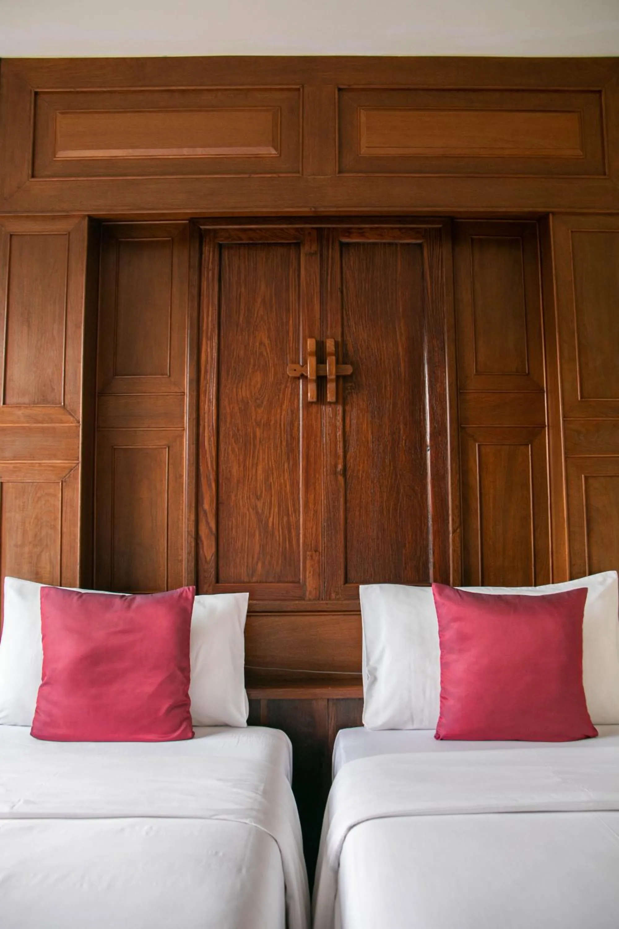 Bed in Lamphu Tree House Boutique Hotel