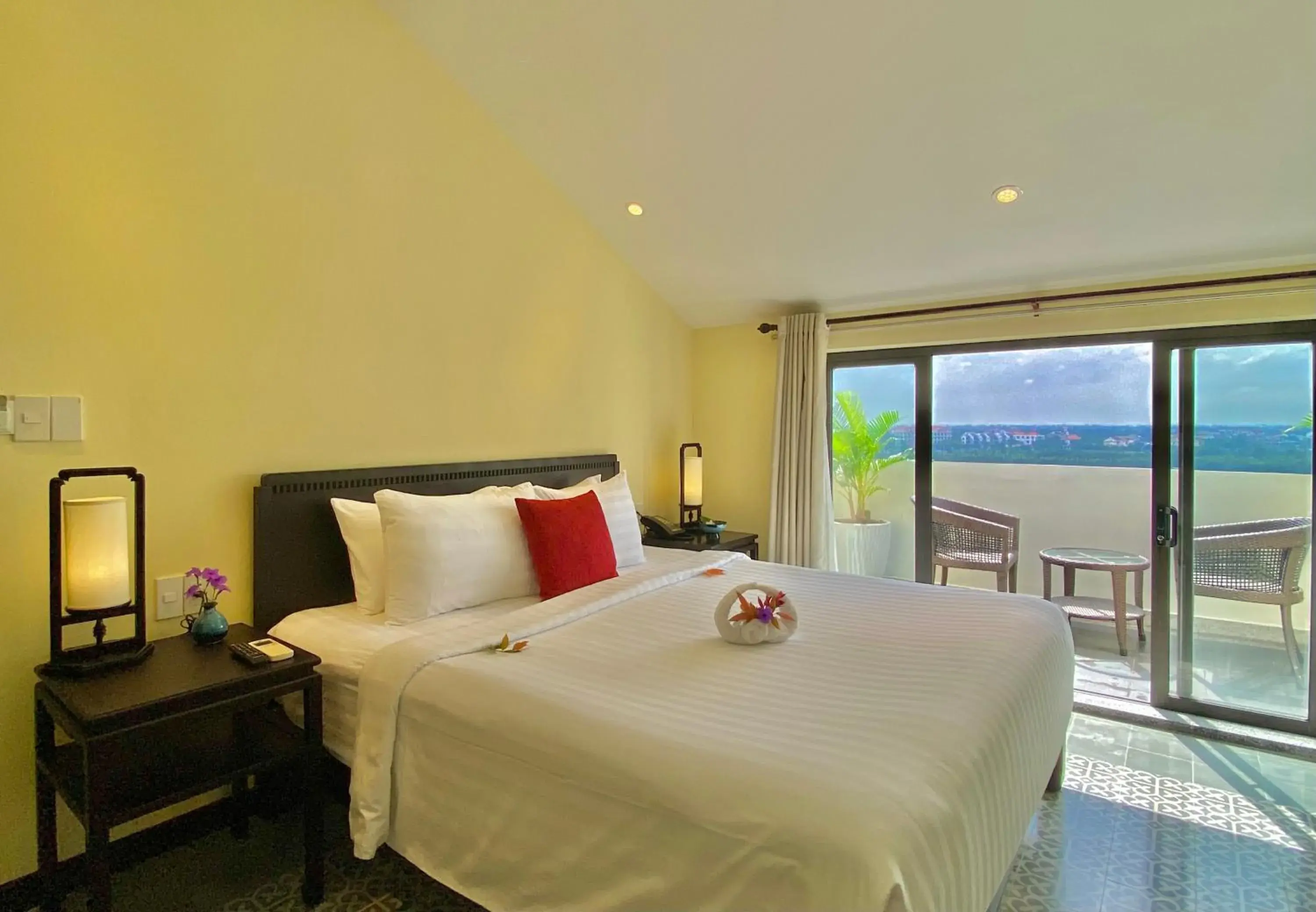 Deluxe Rooftop Room with Riverside View and Balcony in Wyndham Garden Hoi An Cua Dai Beach Deluxe Rooftop Room with Riverside View and Balcony in Wyndham Garden Hoi An Cua Dai Beach