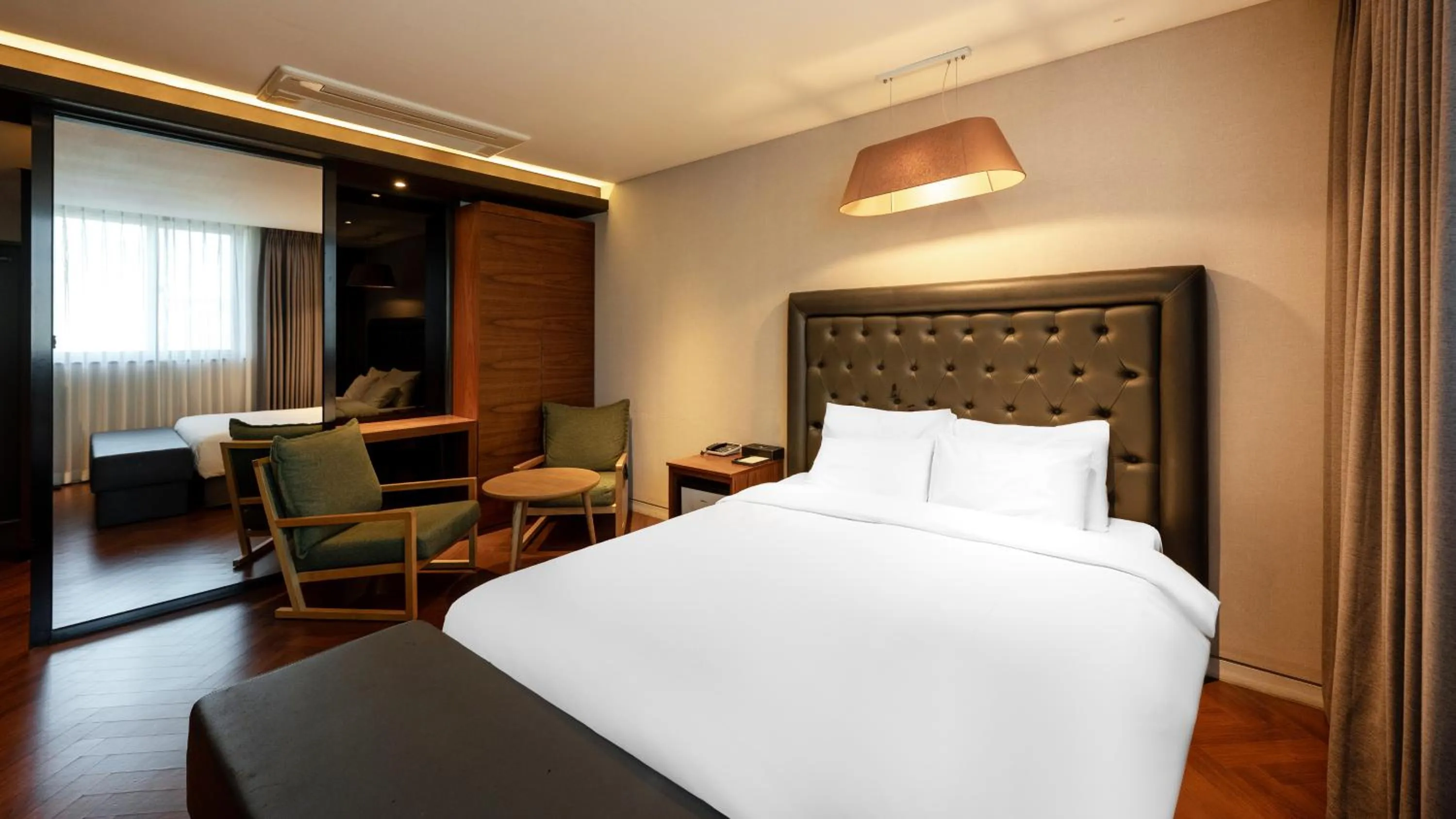 Bed in Golden Business Hotel