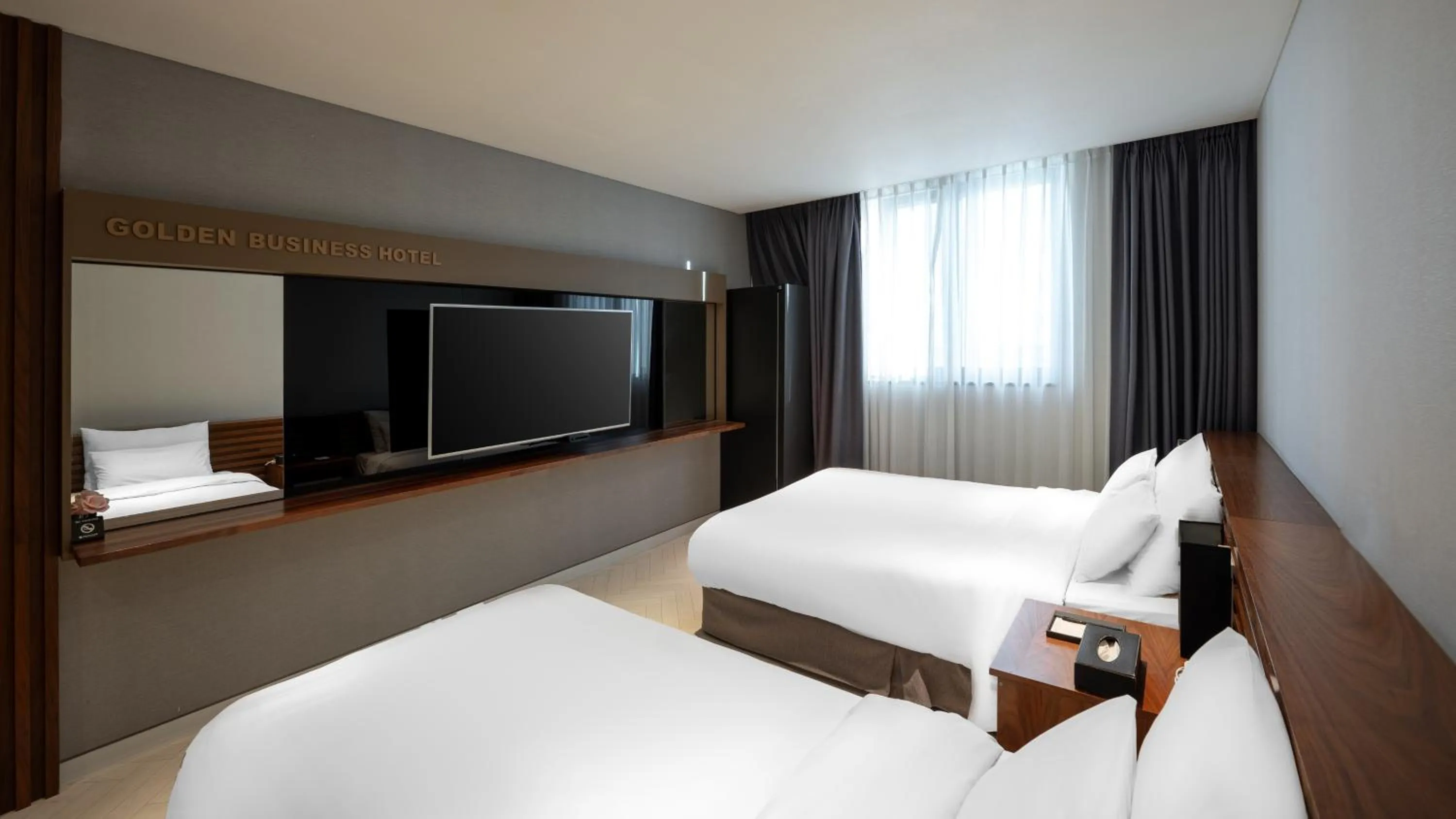 Bed in Golden Business Hotel