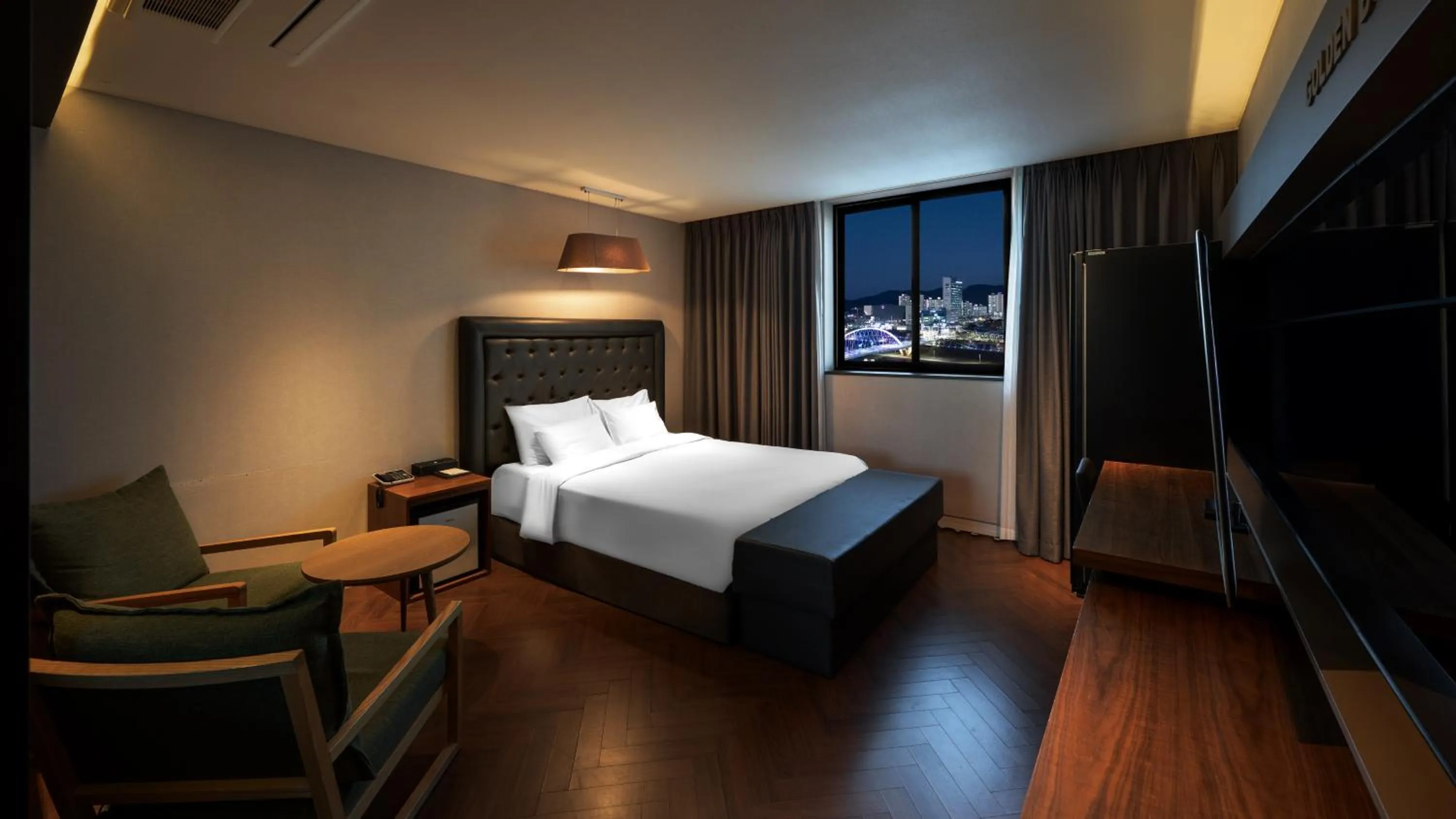 Bed in Golden Business Hotel