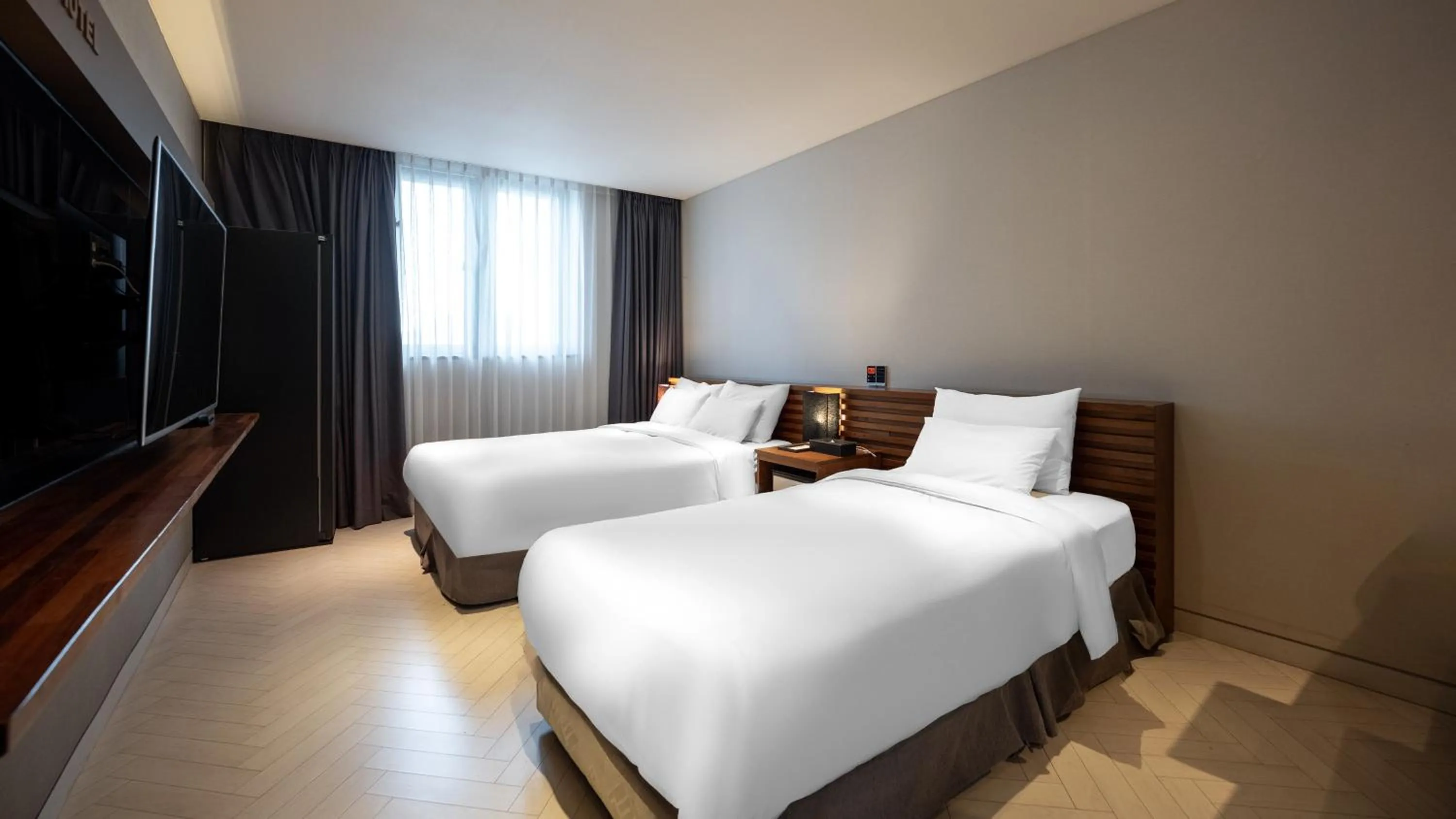 Bed in Golden Business Hotel