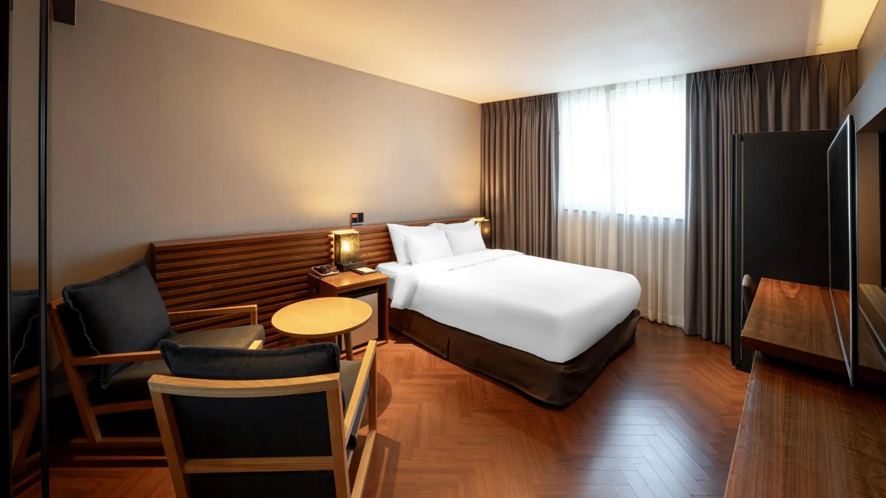 Bed in Golden Business Hotel