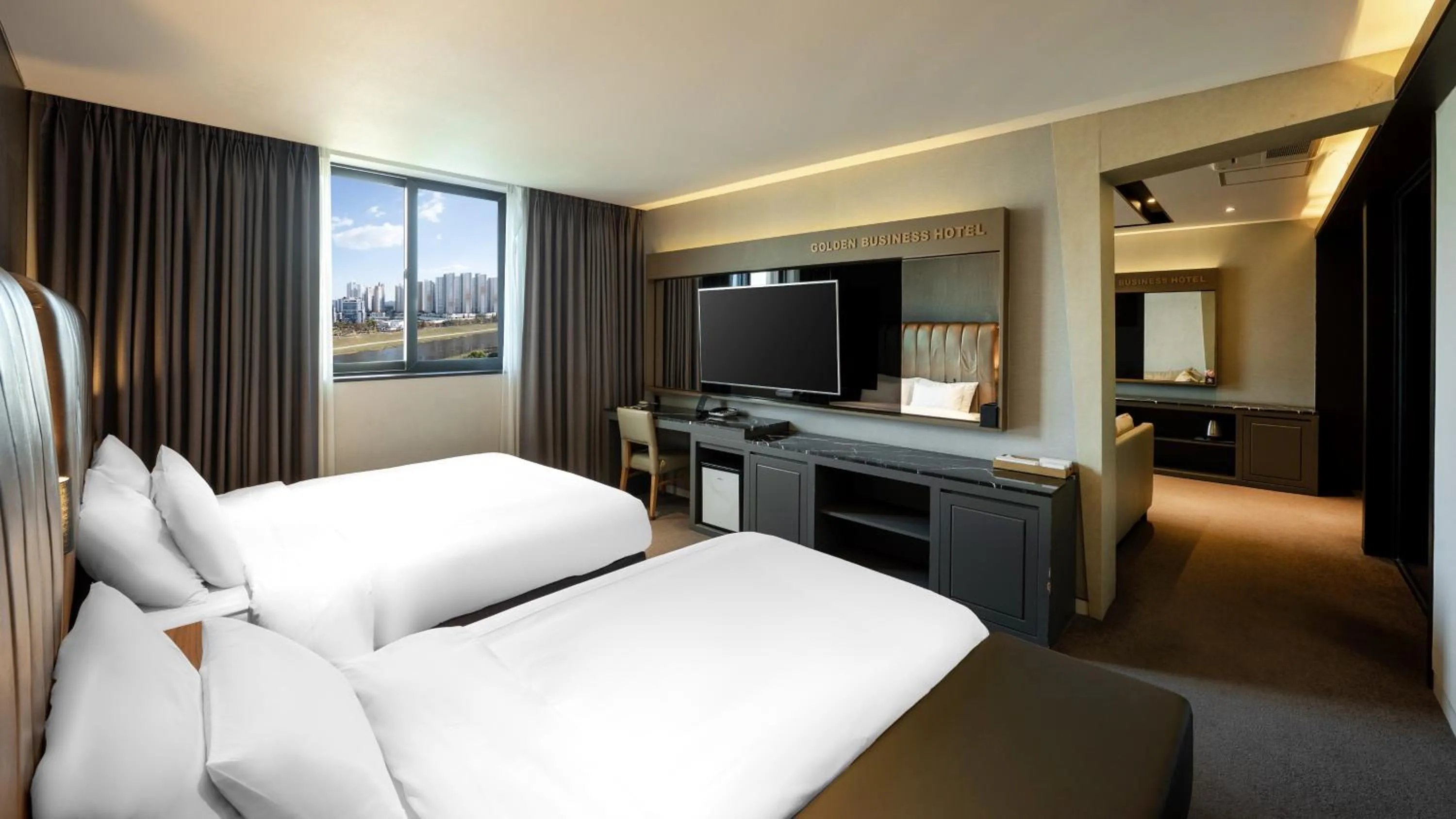 Bed in Golden Business Hotel