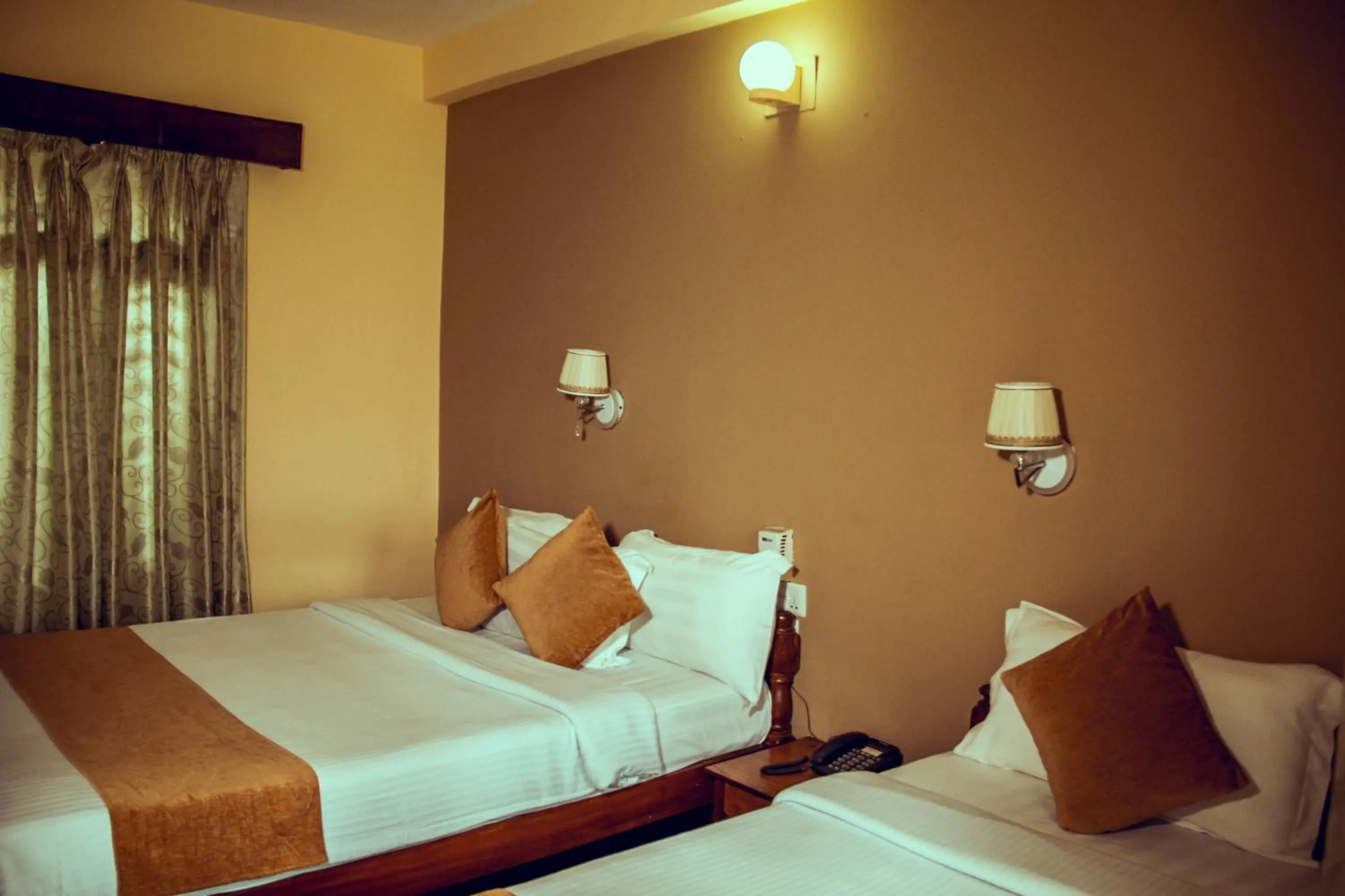 Bed in Lake View Resort