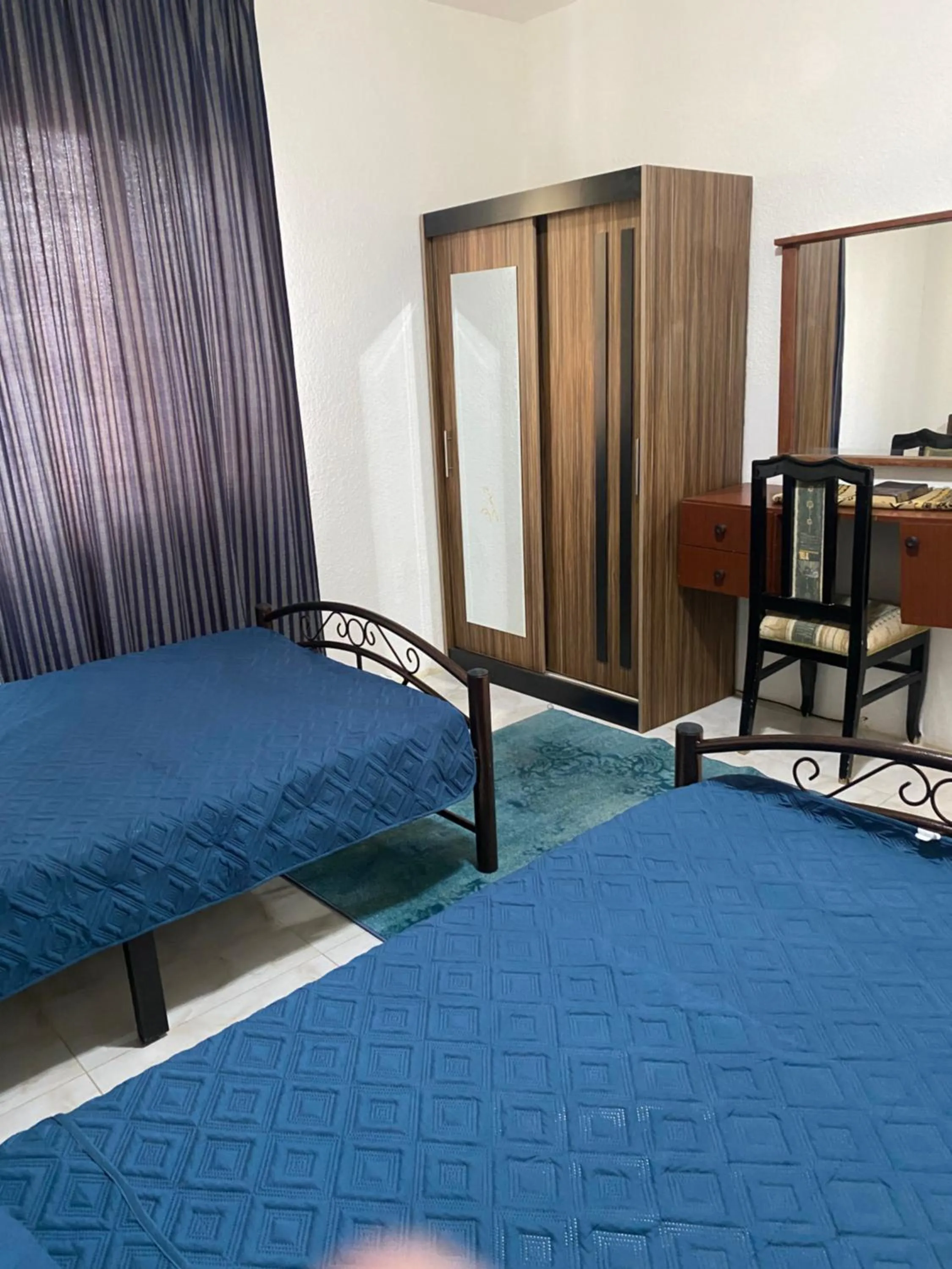 Bed in Sami Apartments