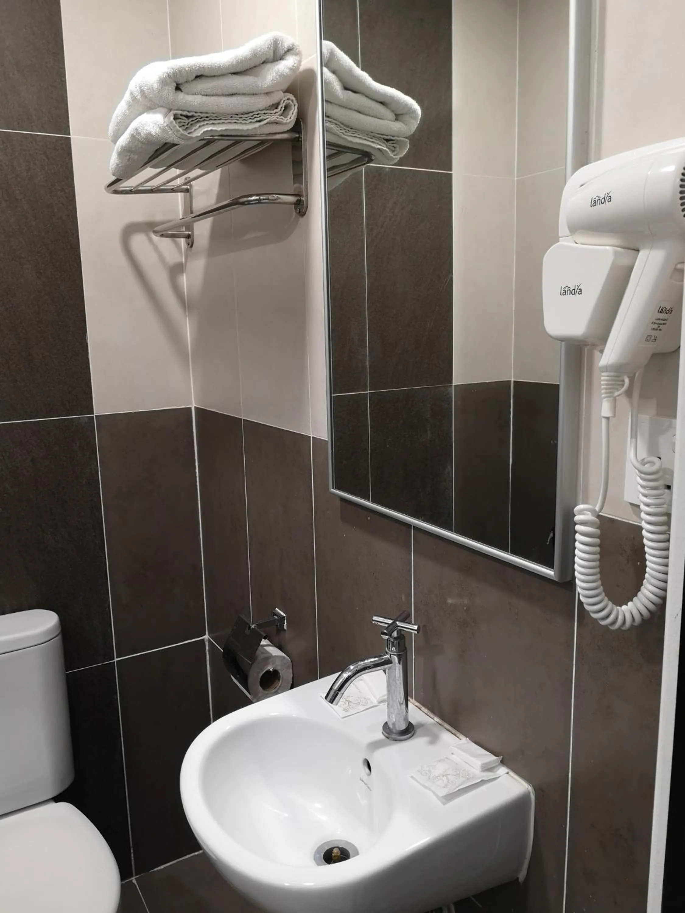 Bedroom in Signature International Hotel China Town