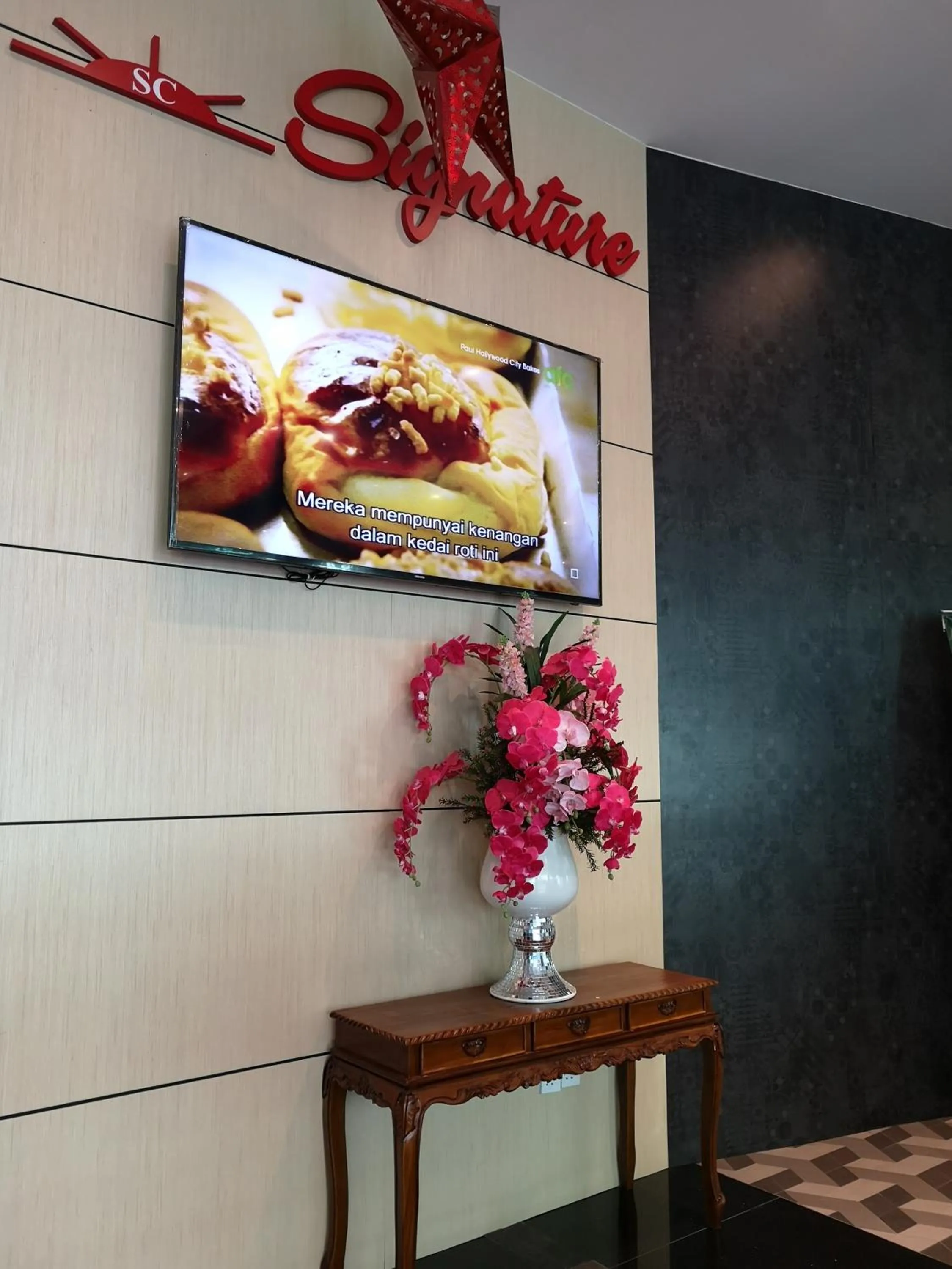 Lobby or reception in Signature International Hotel China Town