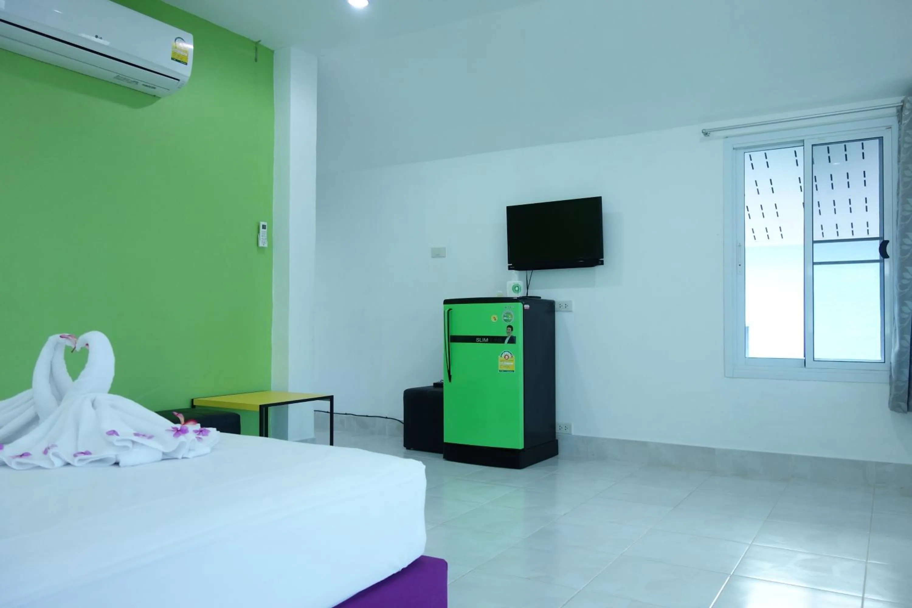 Photo of the whole room, Bed in Mook Ing Lay