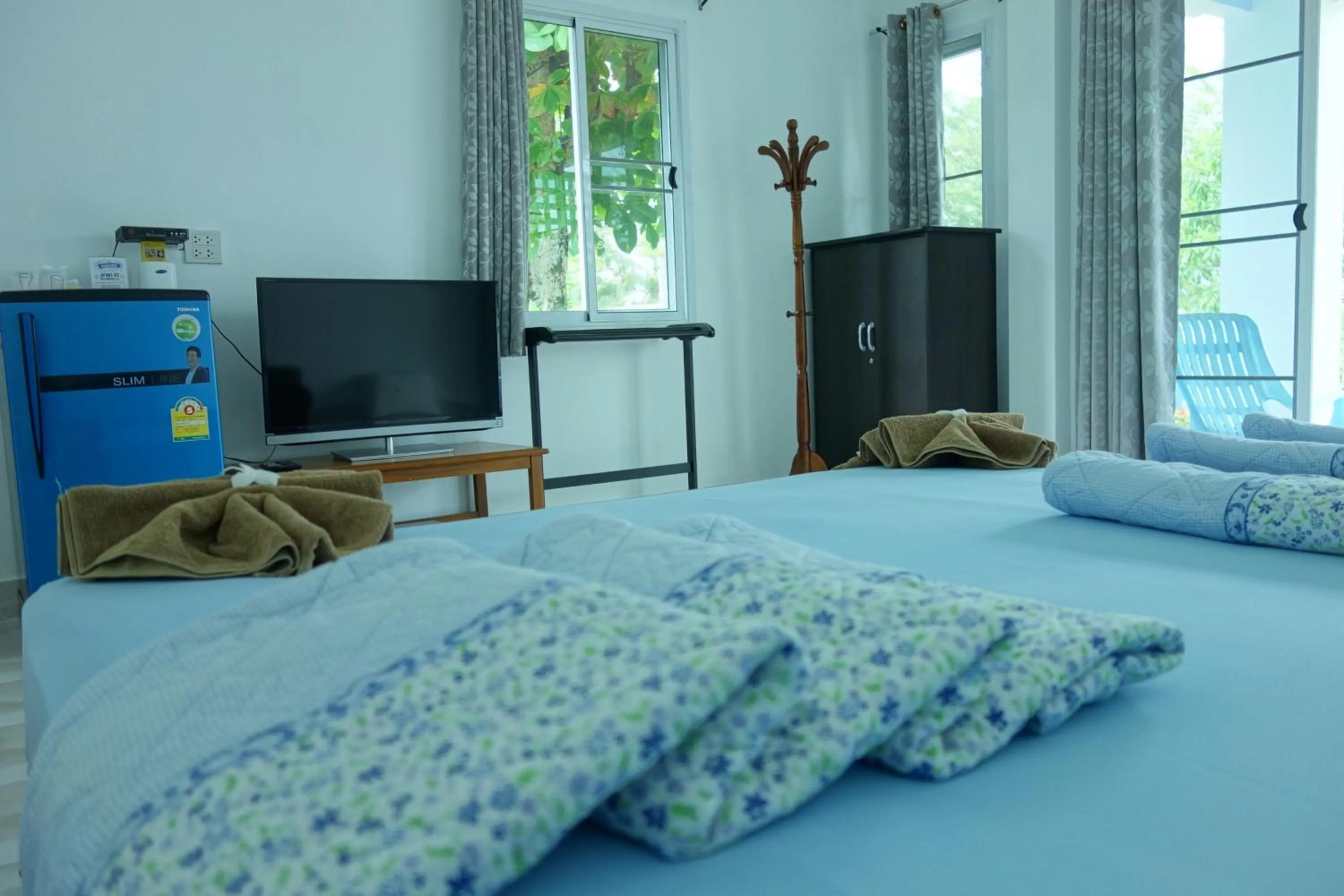 Photo of the whole room, Bed in Mook Ing Lay