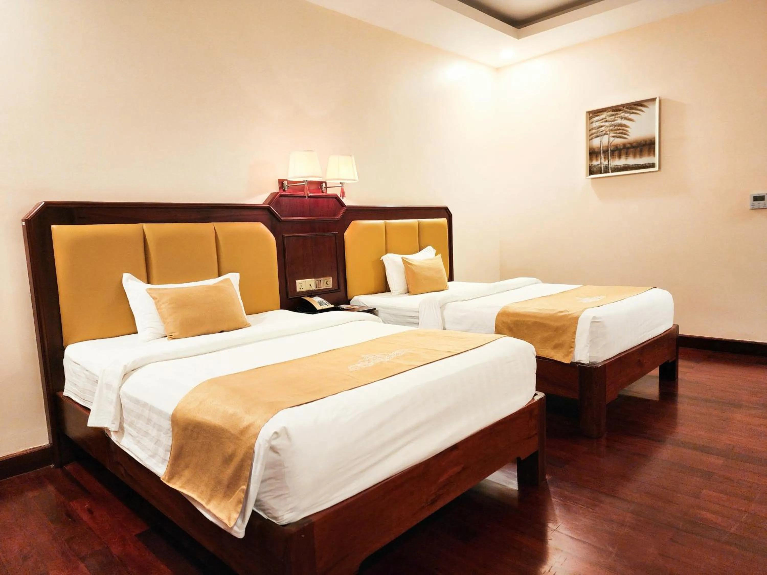 Bed in Lbn Asian Hotel