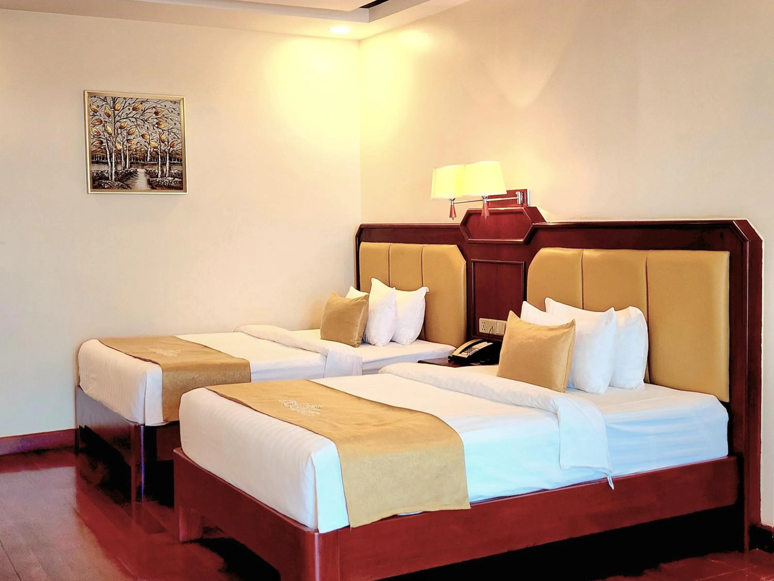 Bed in Lbn Asian Hotel