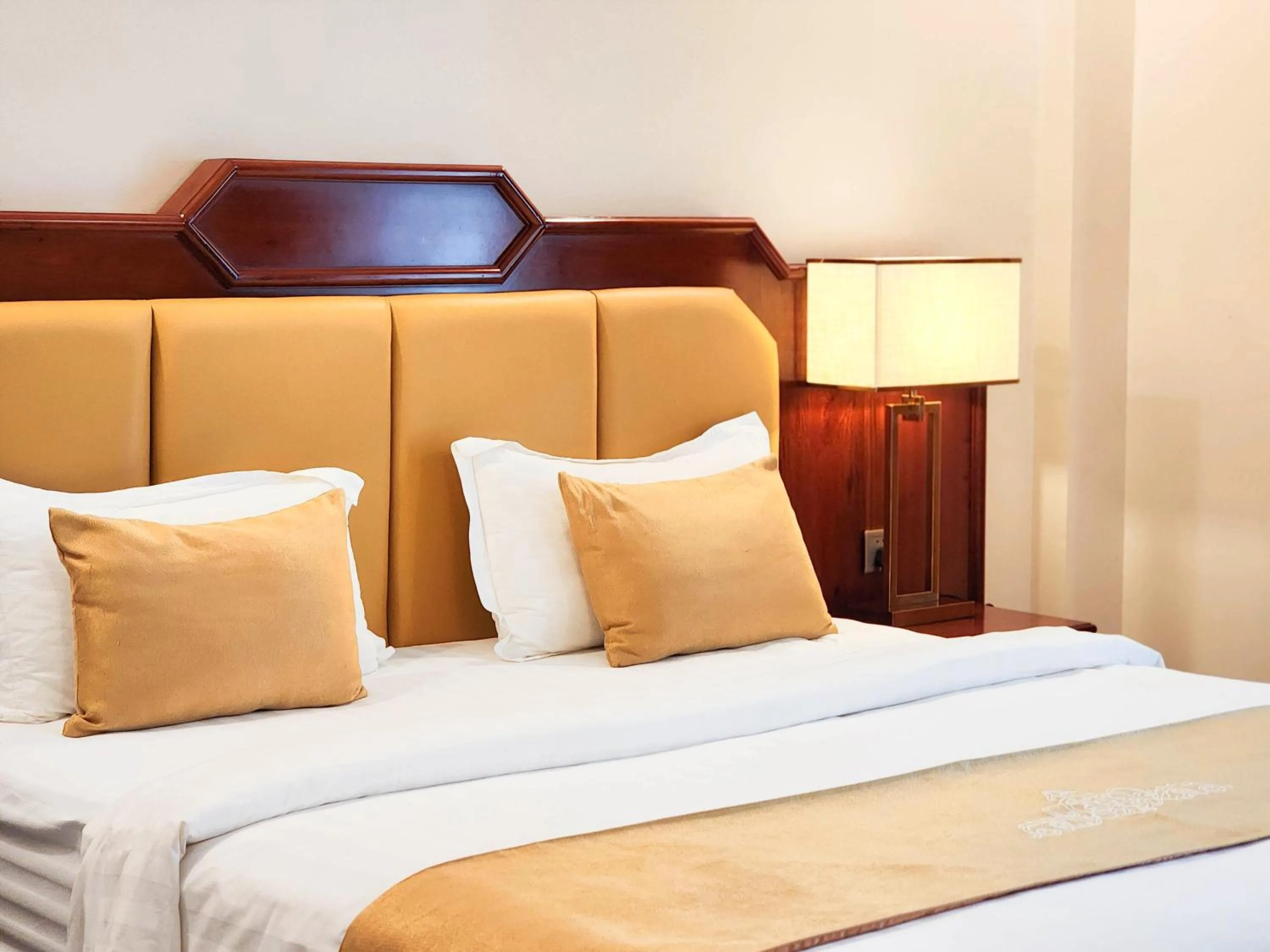 Bed in Lbn Asian Hotel