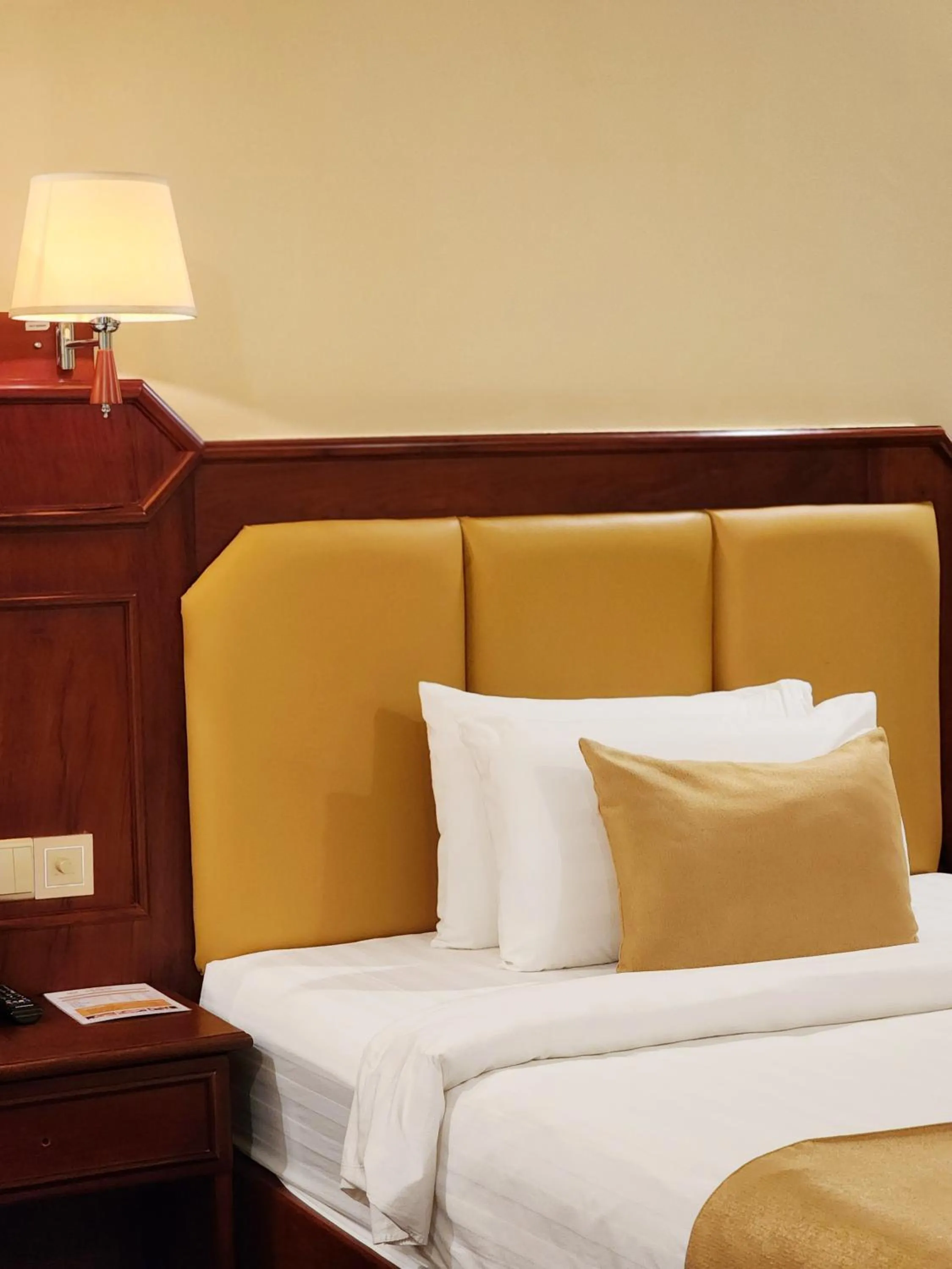 Bed in Lbn Asian Hotel