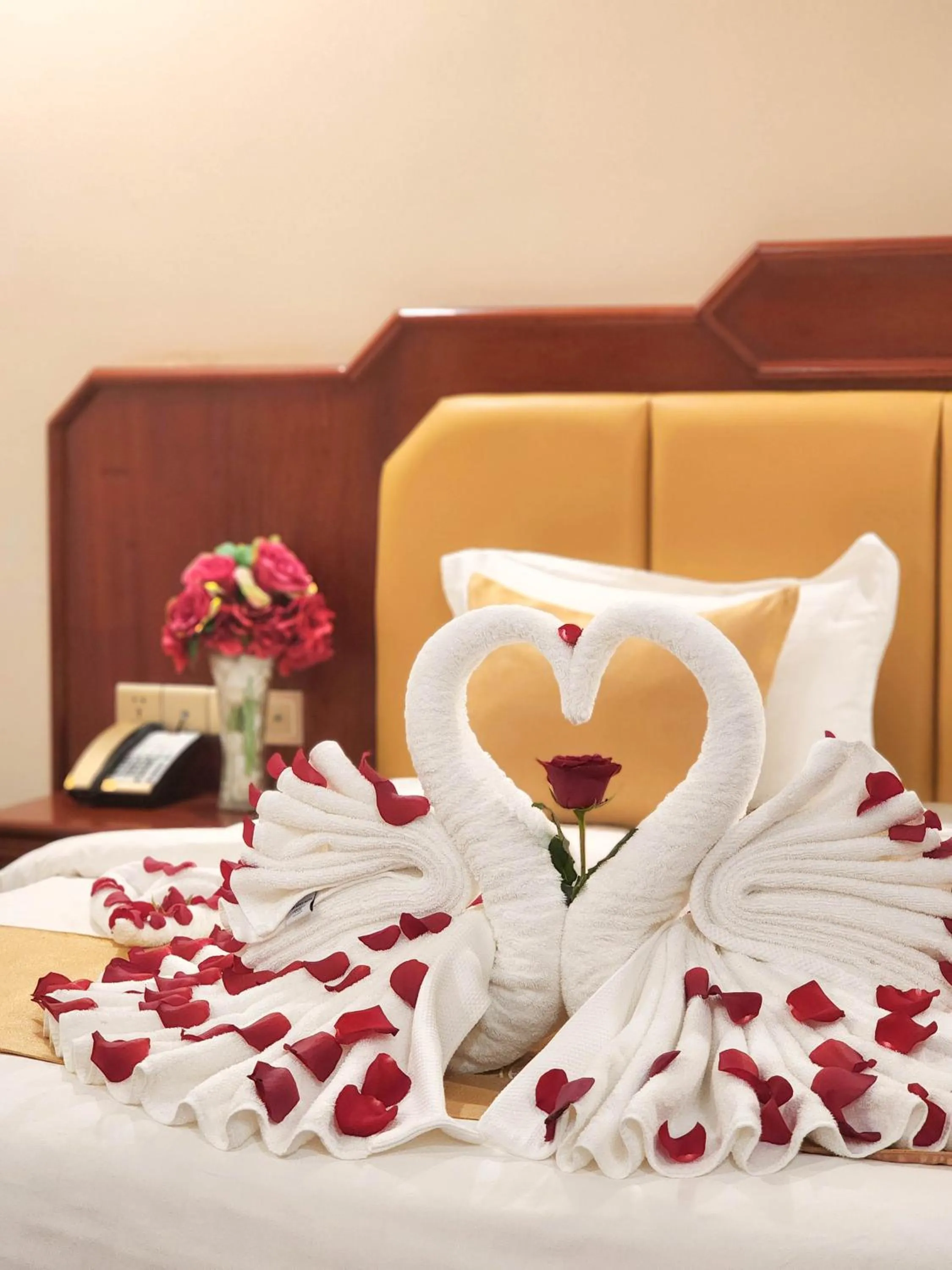 towels, Bed in Lbn Asian Hotel