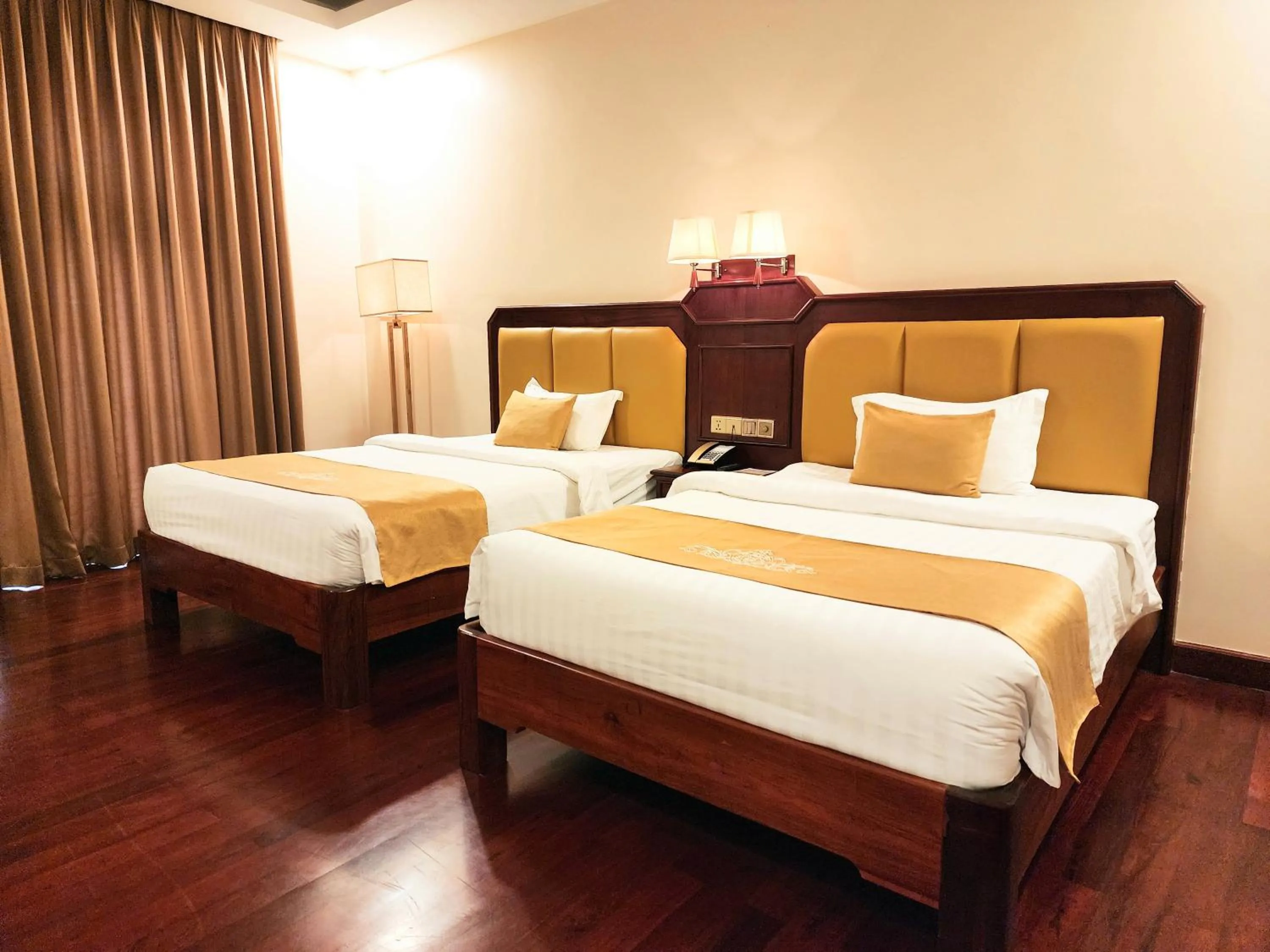 Bed in Lbn Asian Hotel