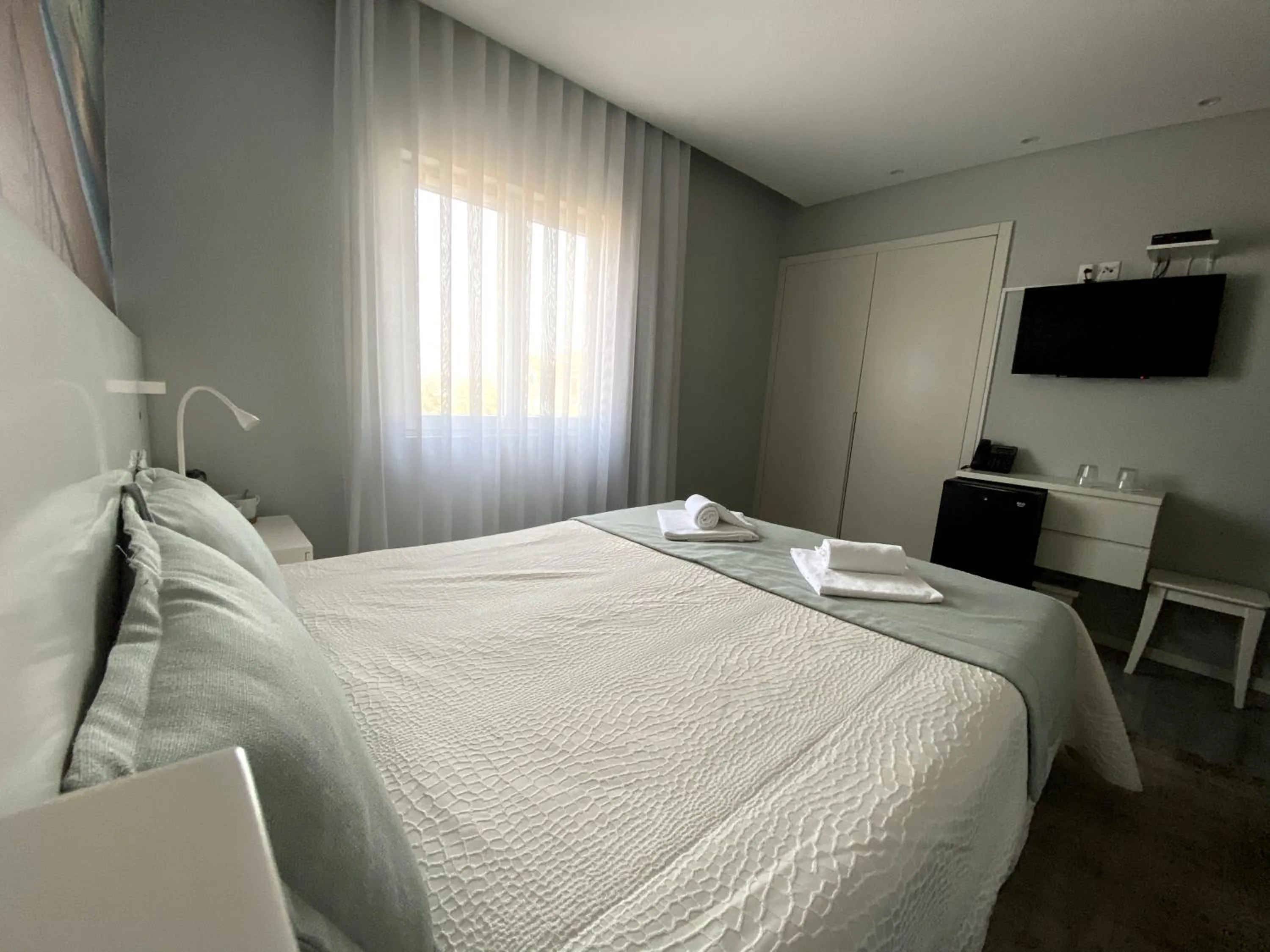 Bed in Golden Beach Guest House & Rooftop Bar